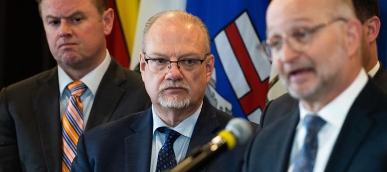 Manitoba Progressive Conservatives are promising to remove the provincial sales tax from restaurant meals if they are re-elected on Oct. 3. Manitoba Justice Minister Kelvin Goertzen, centre, 