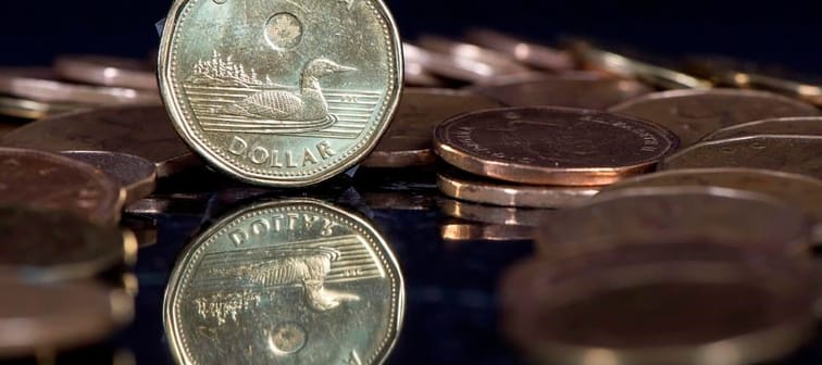 The Canadian dollar coin, the Loonie, is displayed in Montreal, Friday, Jan. 30, 2015. 