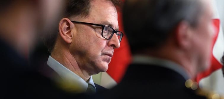 The British Columbia government says it's making progress on a $1 billion, multi-year plan to attract more health-care workers to the province. Health Minister Adrian Dix looks on during a pr