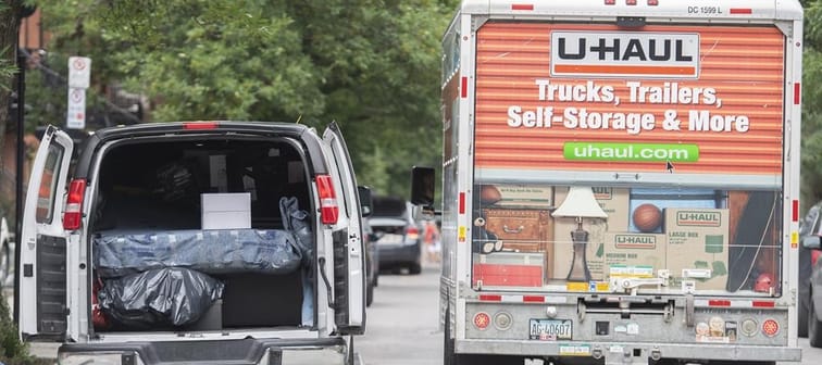 Your parents are finally downsizing after 40 years in the same house &mdash; and you want to help. Where to even start?A U-Haul truck passes a van loaded with furniture in Montreal on Friday,