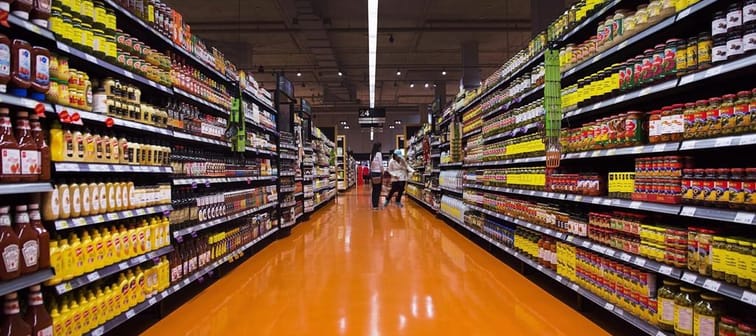 Experts say the main factors that have driven grocery prices up over the past couple of years are global ones. People shop at a Loblaws store in Toronto on Thursday, May 3, 2018. 
