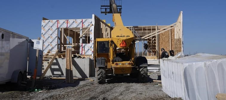 Canada Mortgage and Housing Corp. says the annual pace of housing starts in March declined seven per cent compared with February. Work continues at a new housing development in Belleville, On
