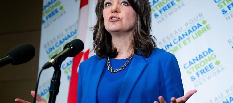 The Alberta government is proposing measures that aim to protect power consumers from wild price swings. Alberta Premier Danielle Smith speaks to reporters on the sidelines of the Canada Stro