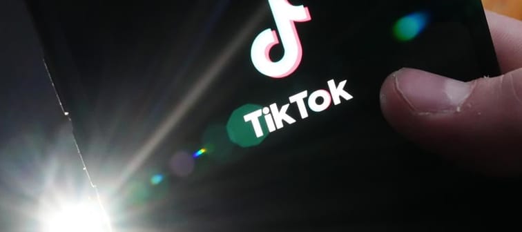 TikTok is testing an app that rivals Instagram in Canada. The TikTok startup page is displayed on an iPhone in Ottawa, Monday, Feb. 27, 2023. 