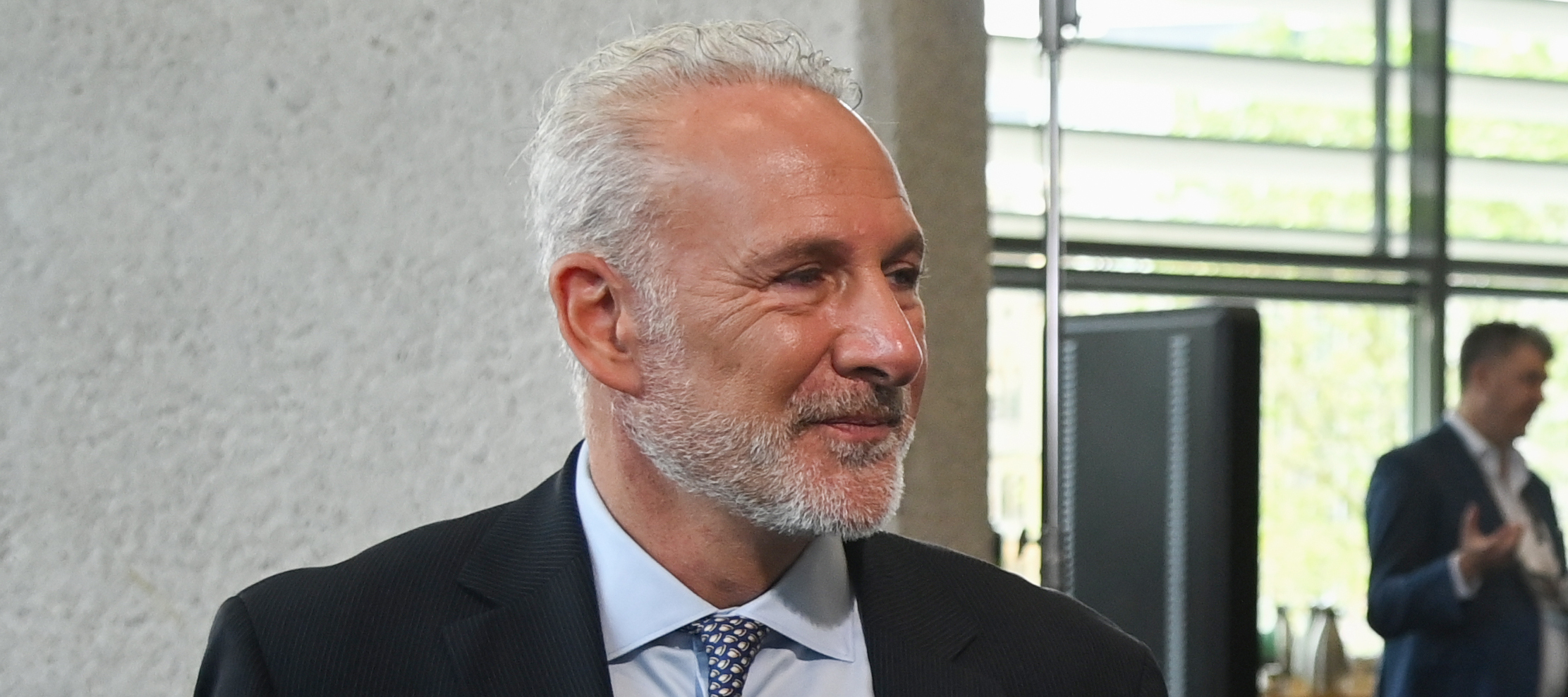 Peter Schiff and Calvin Ayre are seen chatting during the London Blockchain Conference at The Queen Elizabeth II Conference Centre on June 02, 2023 in London, England.