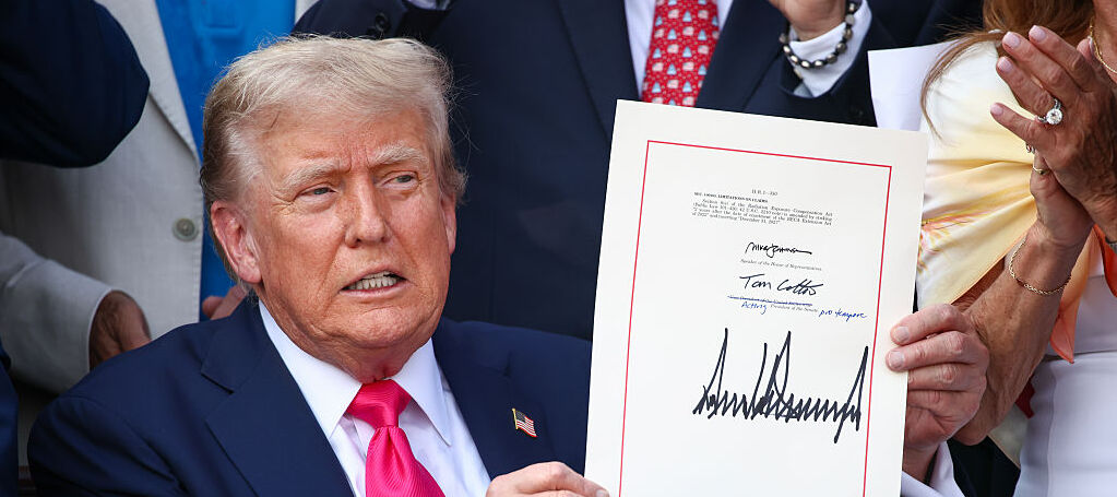 President Donald Trump signs the One, Big Beautiful Bill Act into law.