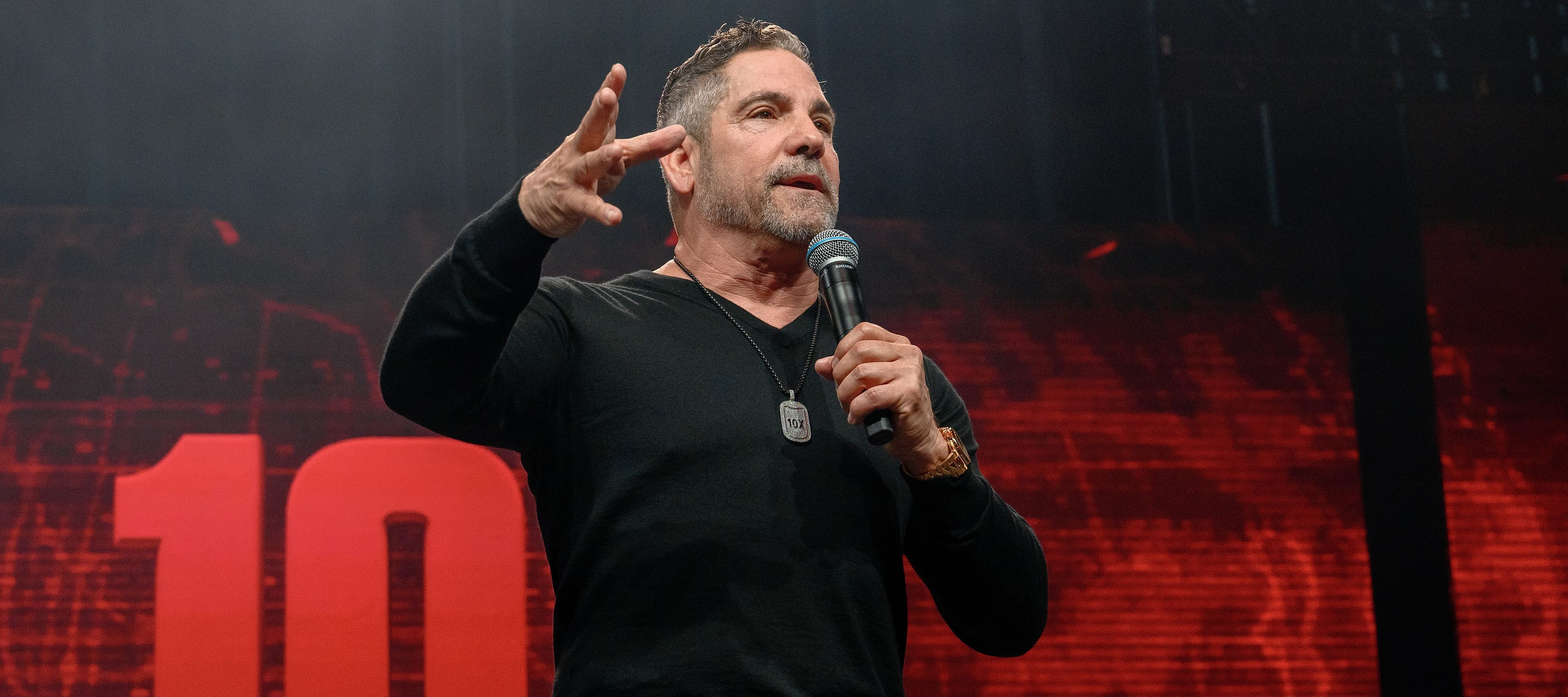 Grant Cardone speaking at a conference.