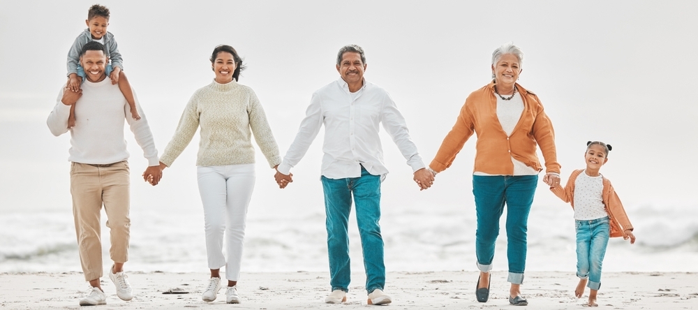Multi-generation family portrait on the beach.