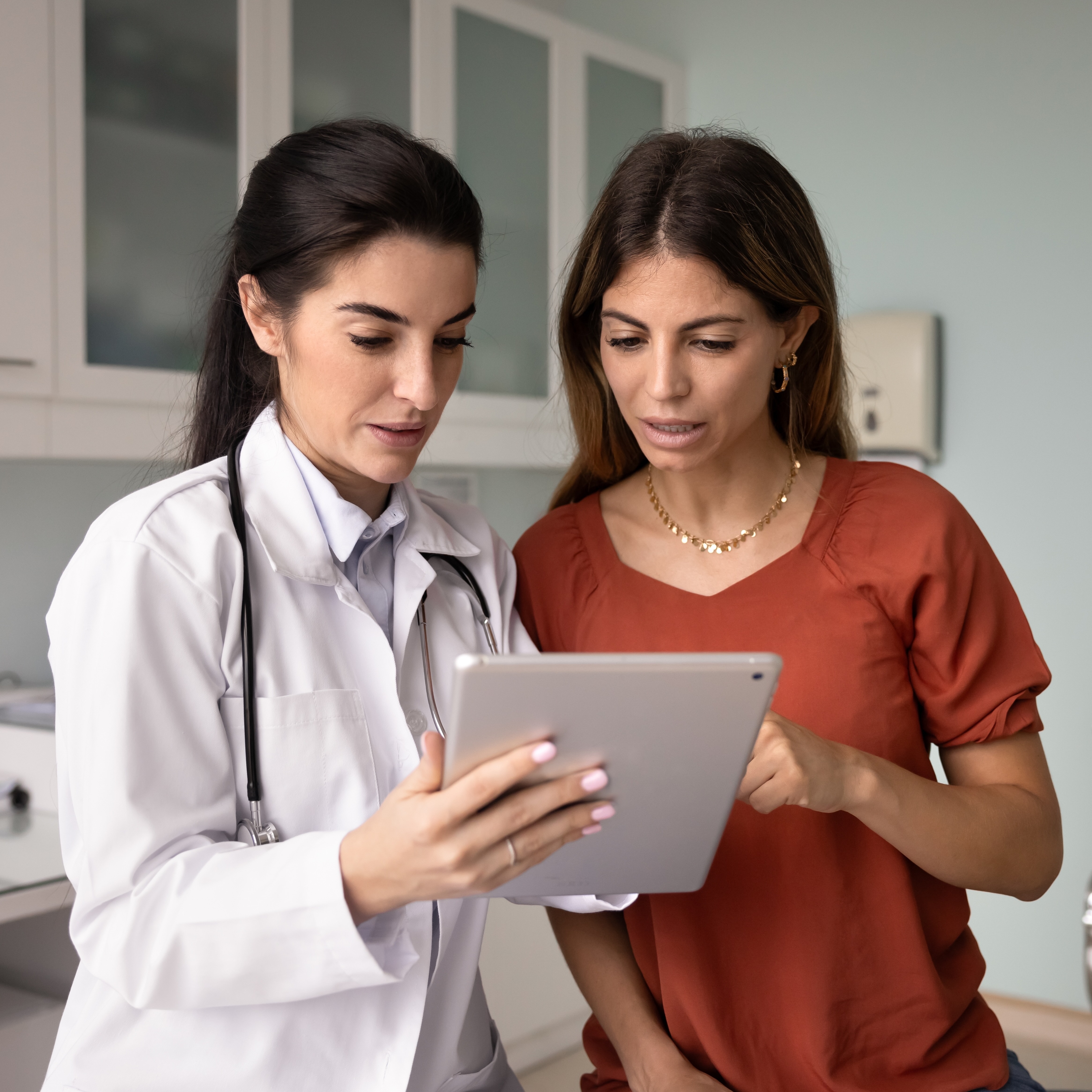 Woman visiting her doctor.