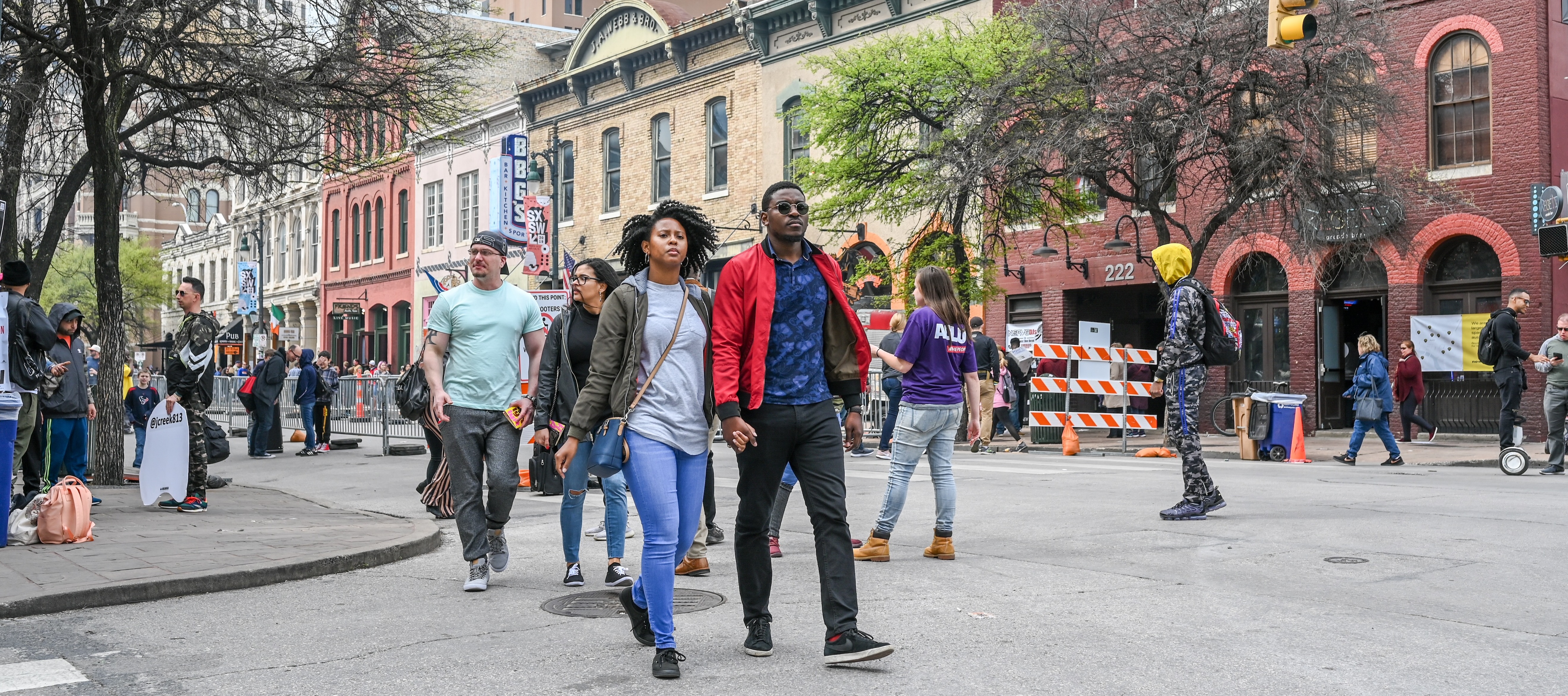 People crowd Sixth Street in Austin, Texas, March 15, 2019.