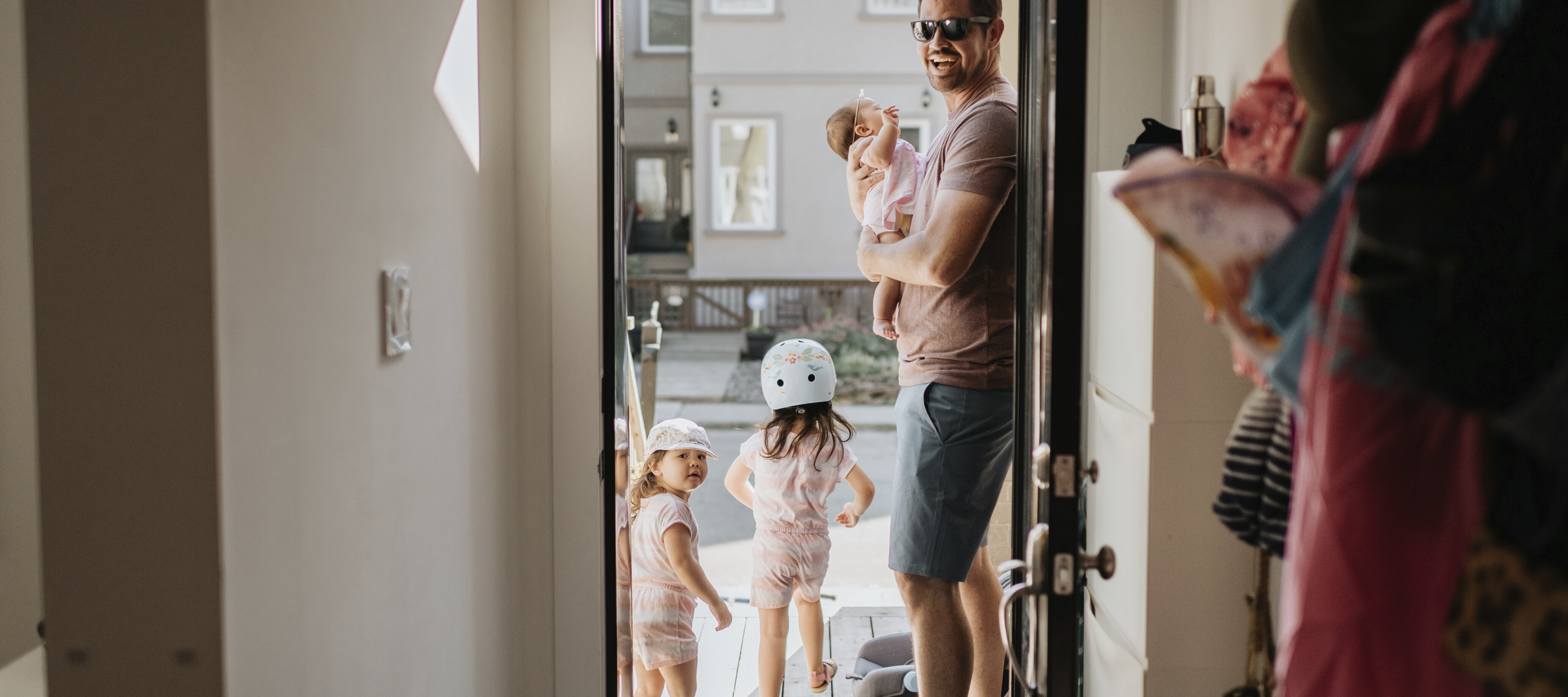 Happy dad picking up his 3 kids from their mom's house.