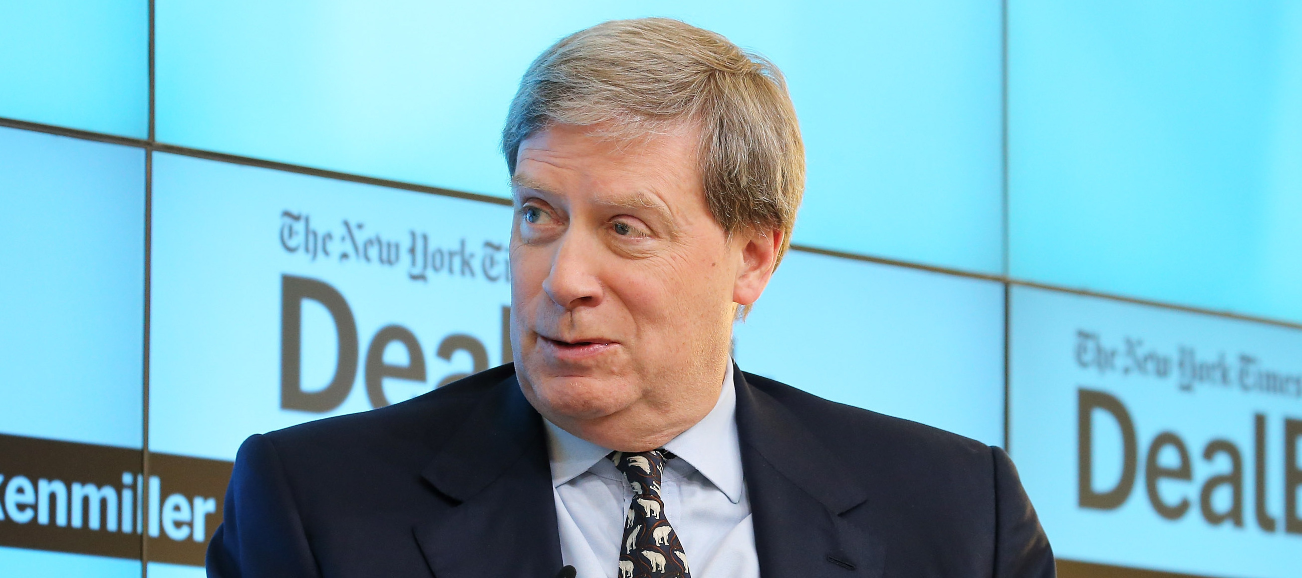 Billionaire Neilson Barnard speaks at  panel discussion.