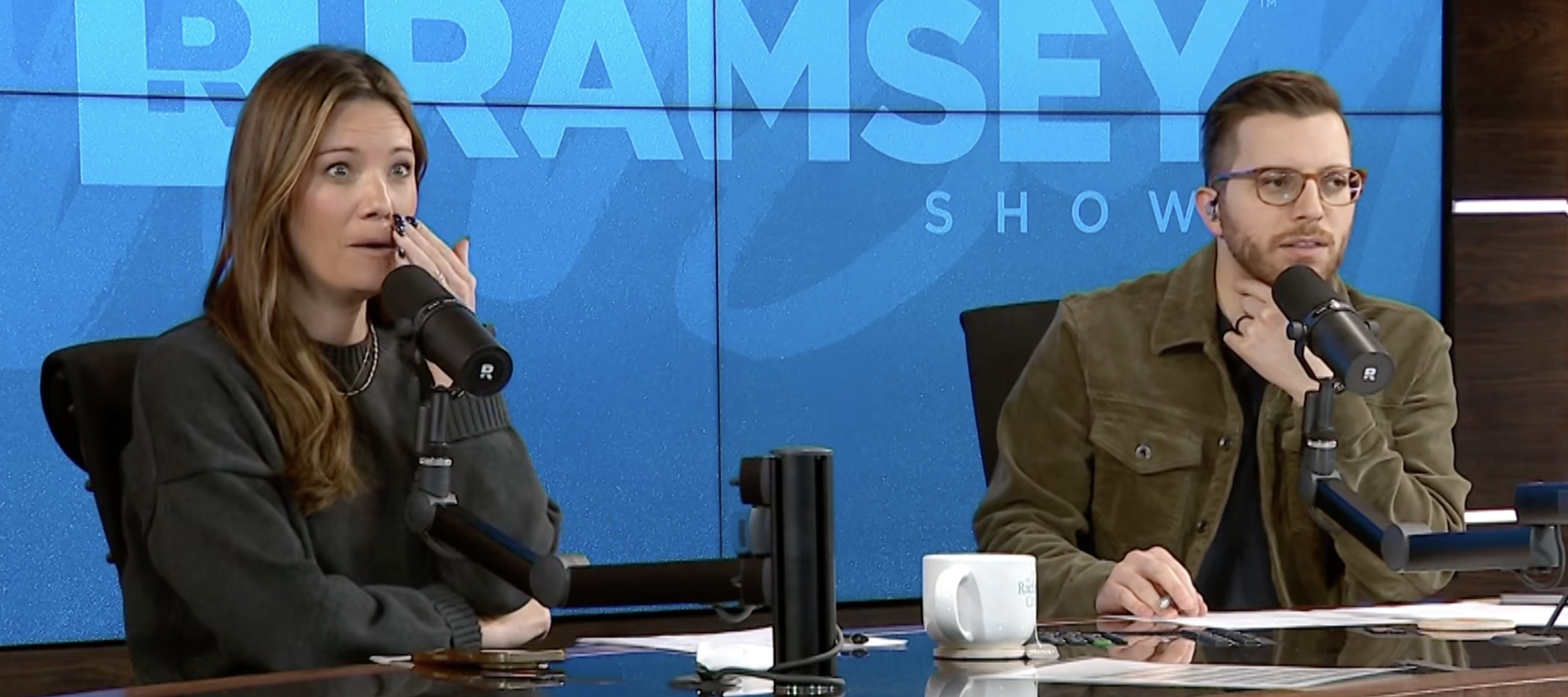 Rachel Cruze and Goerge Kamel react with shock about a caller whose mother wants to gift him a $100,000 truck.