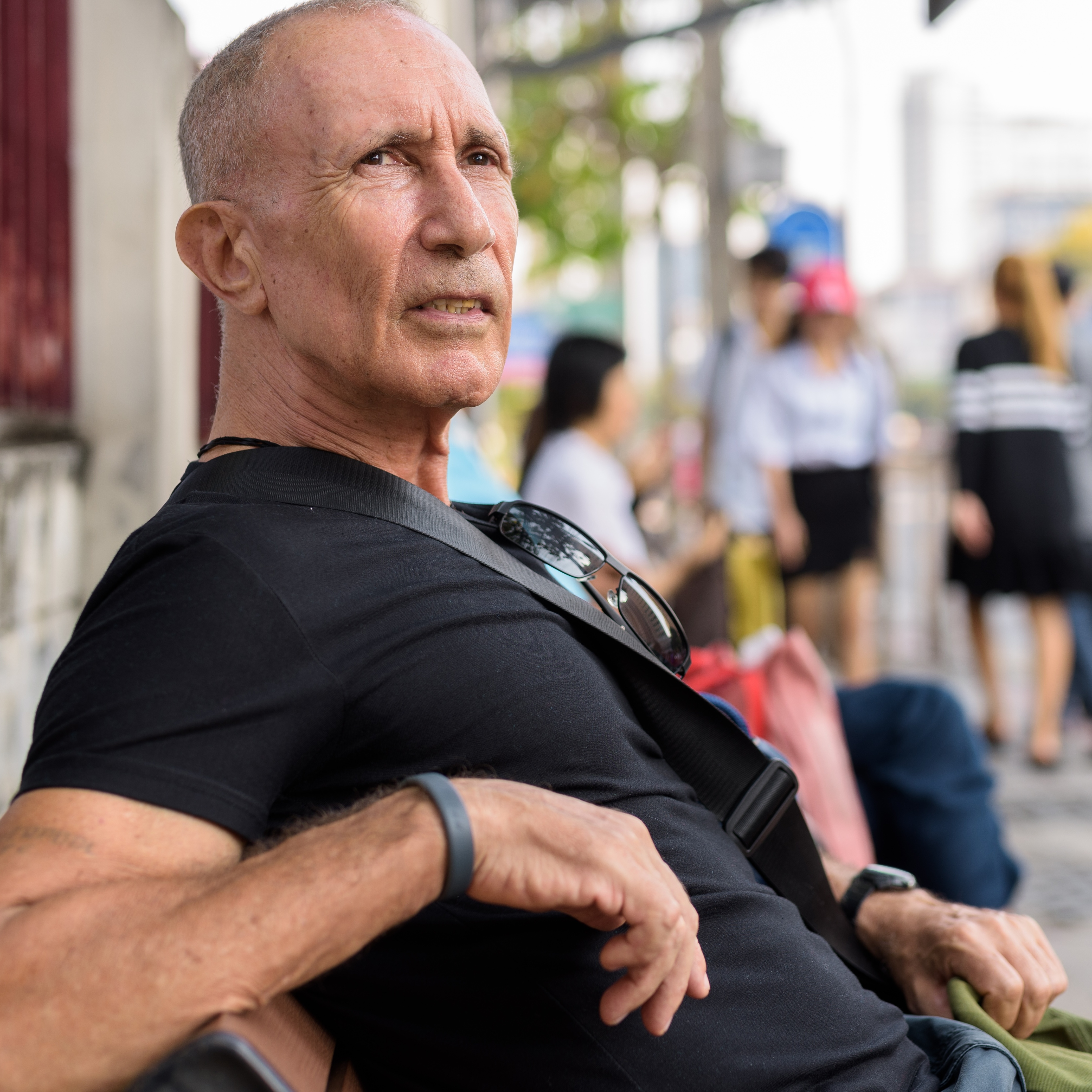 A man waiting at a bus stop could be one of many Gen Xers who worry they are behind on their retirement savings.