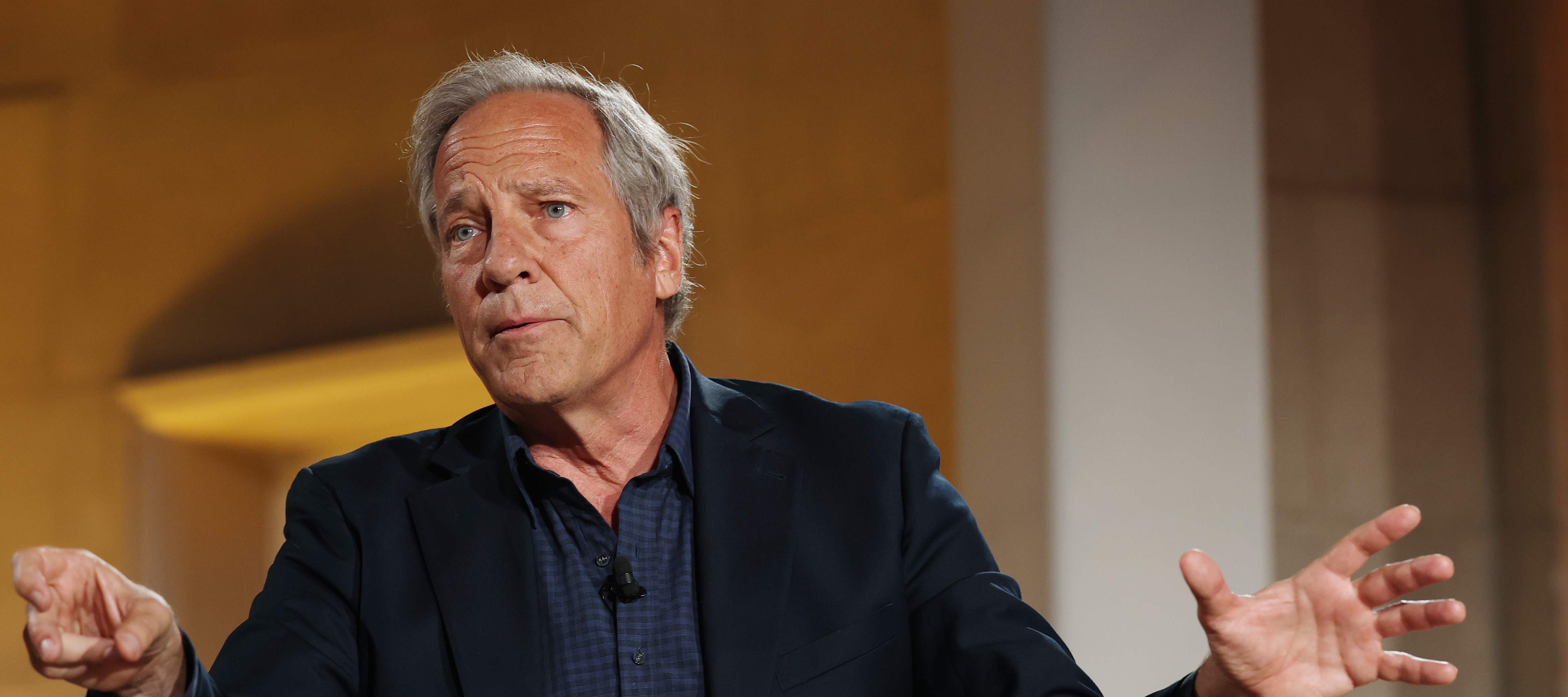 Mike Rowe speaking at BlackRock Infrastructure Summit on March 11, 2026