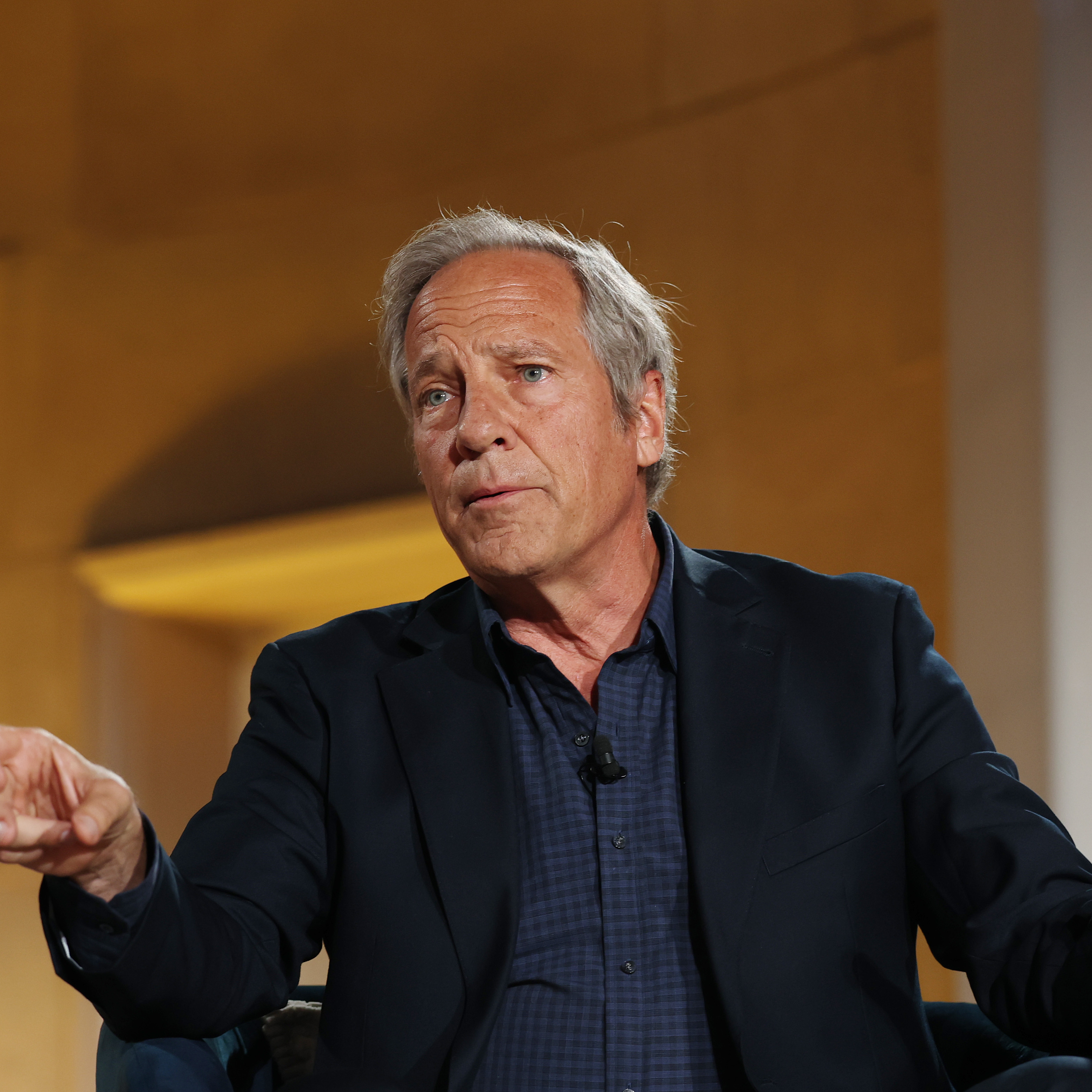 Mike Rowe speaking at BlackRock Infrastructure Summit on March 11, 2026