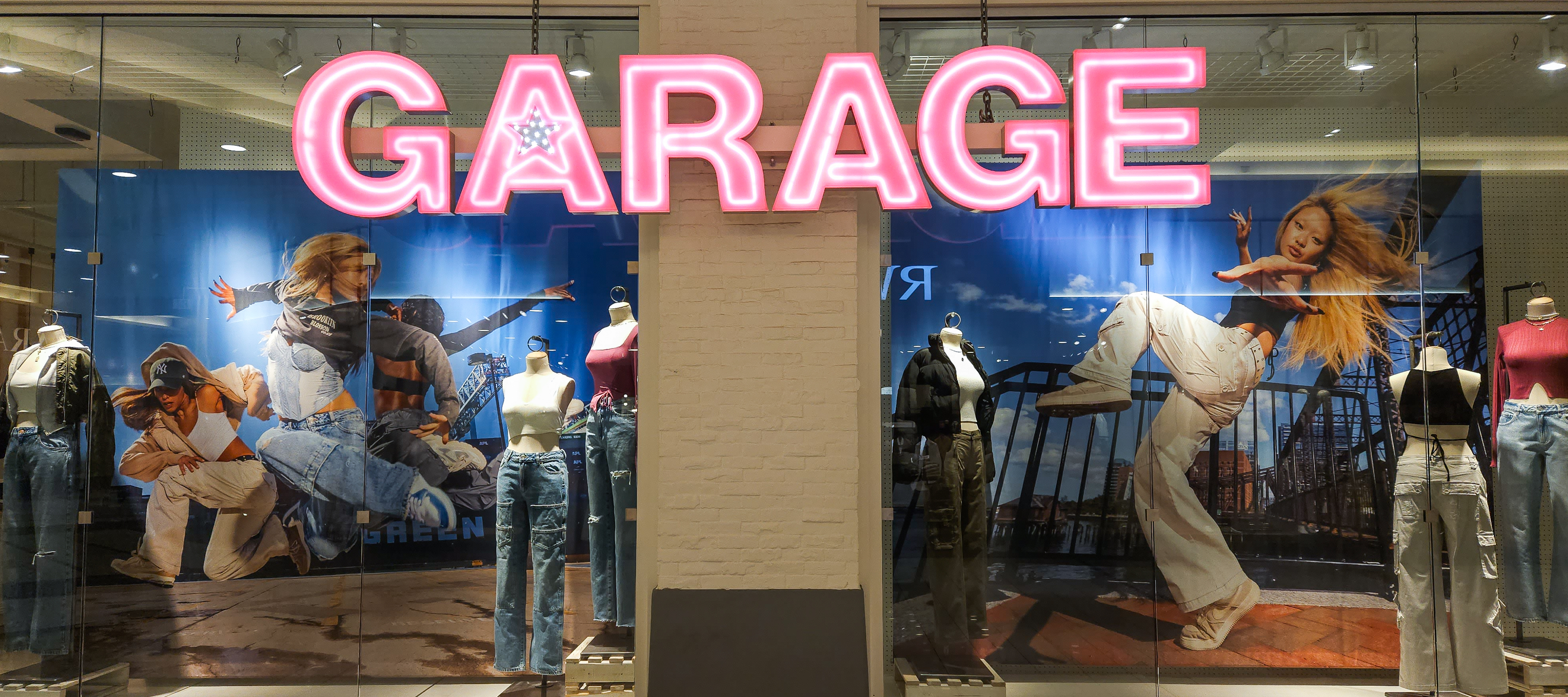 View of the Garage clothing store and logo inside a local Edmonton shopping center.