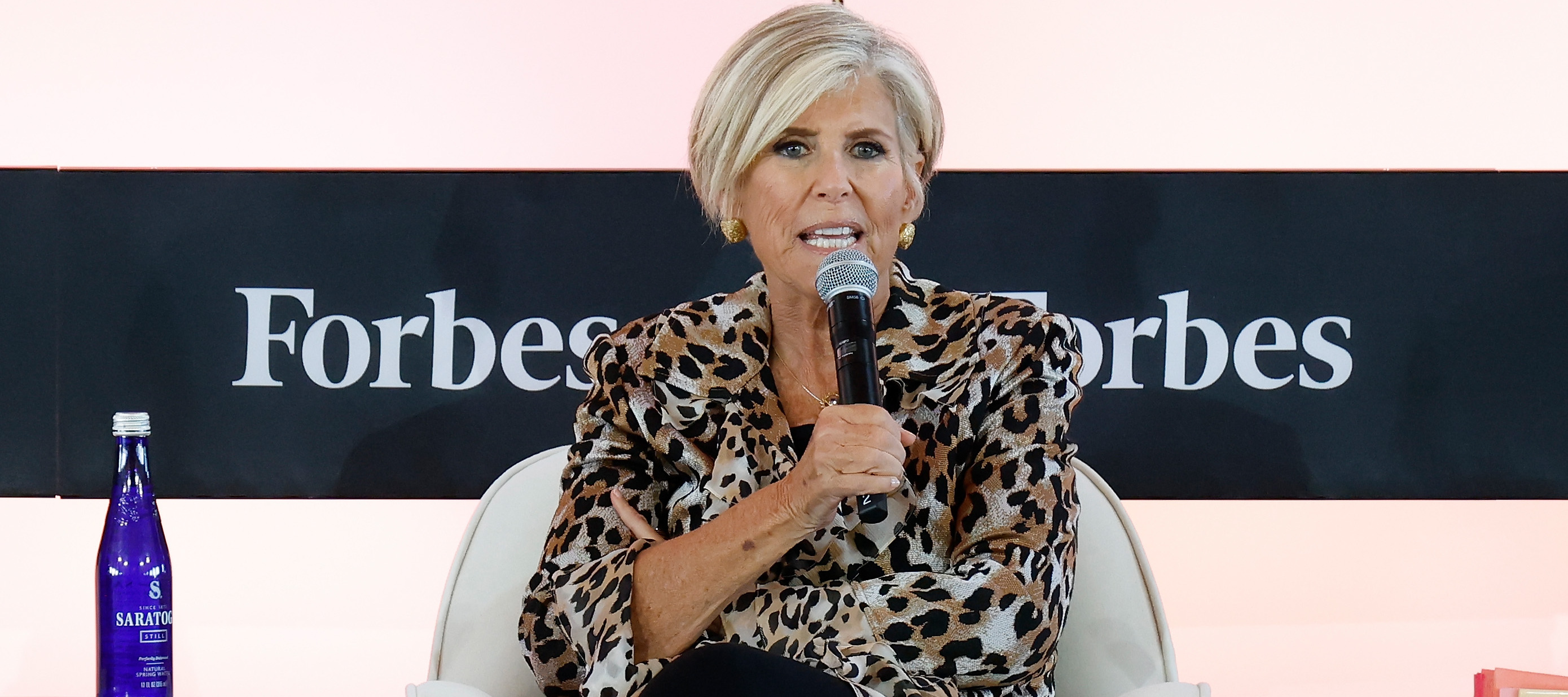 Suze Orman speaks at an event.