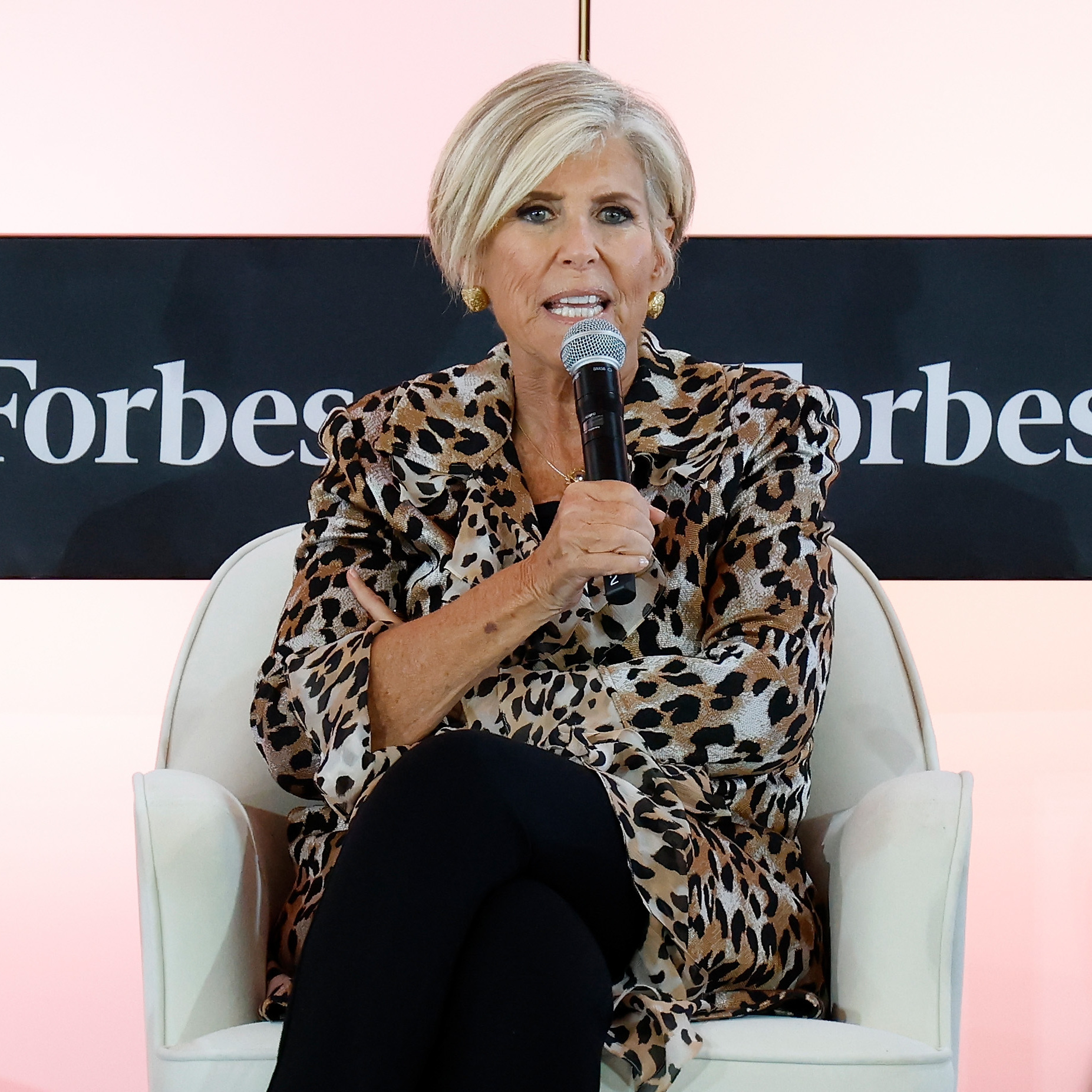 Suze Orman speaks at an event.