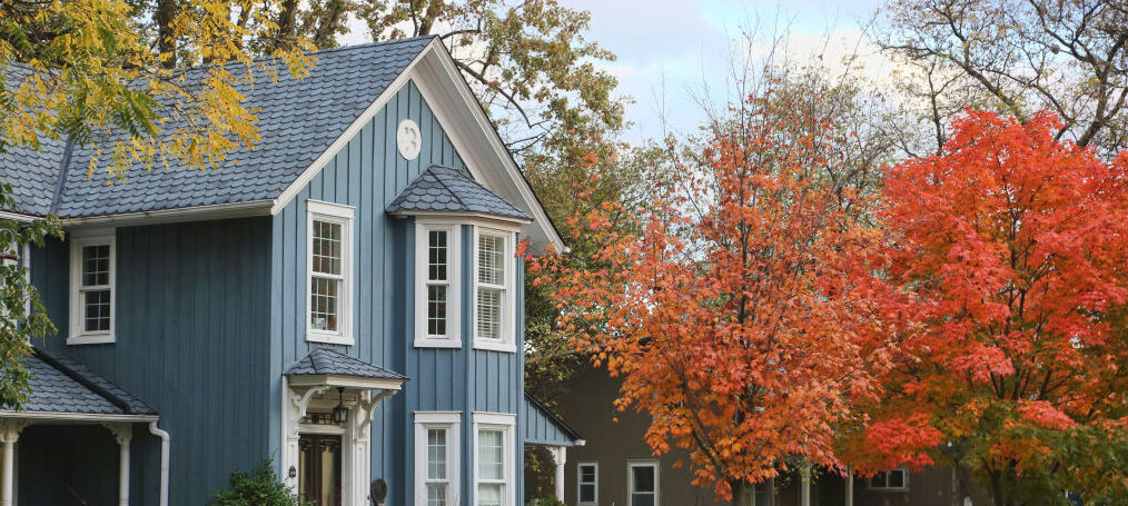 Old house pictured during the autumn season.