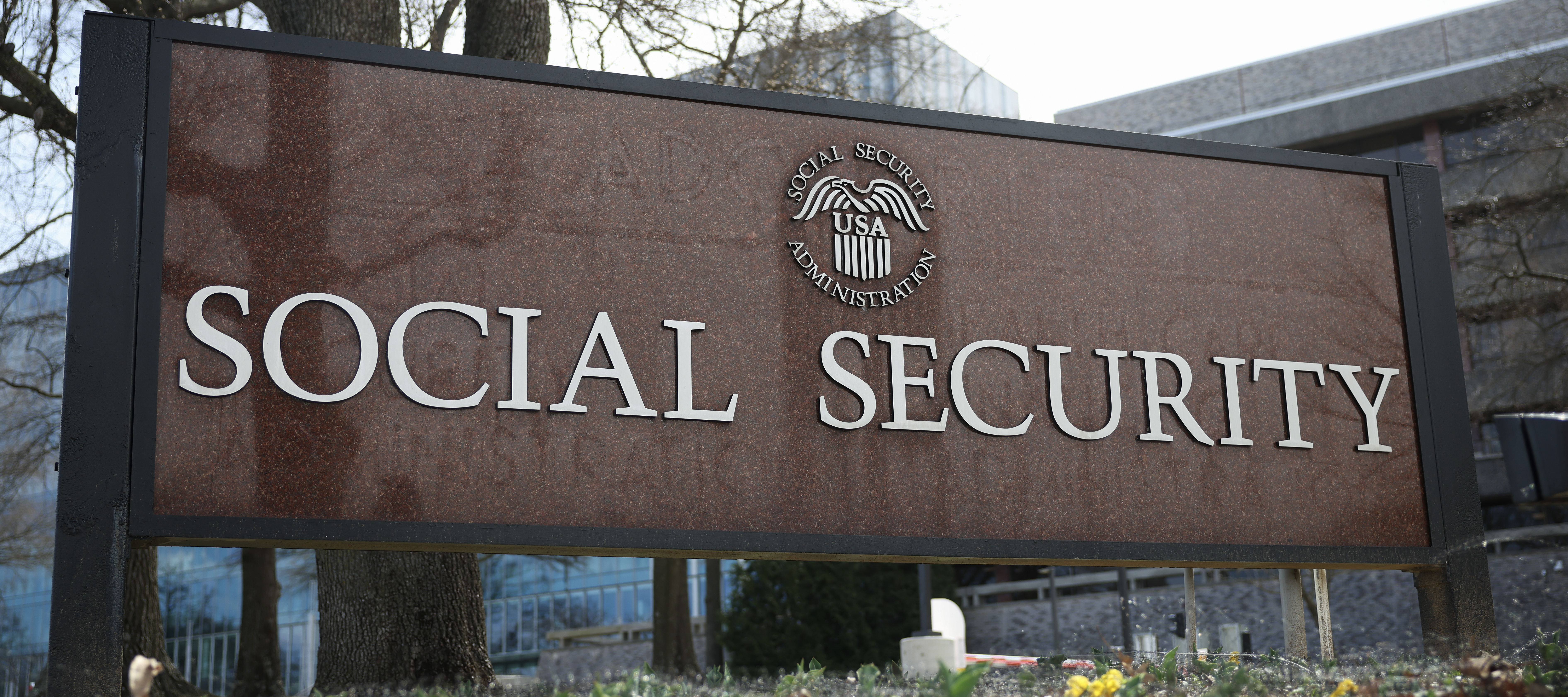 A sign in front of the entrance of the Security Administration's main campus on a gloomy March day.