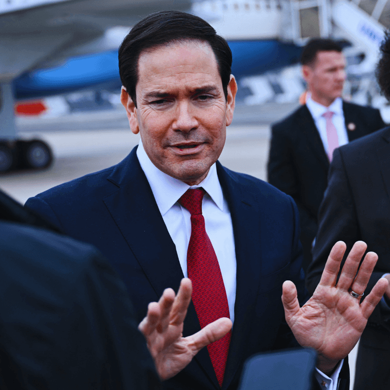Marco Rubio and Trump speak to reporters.