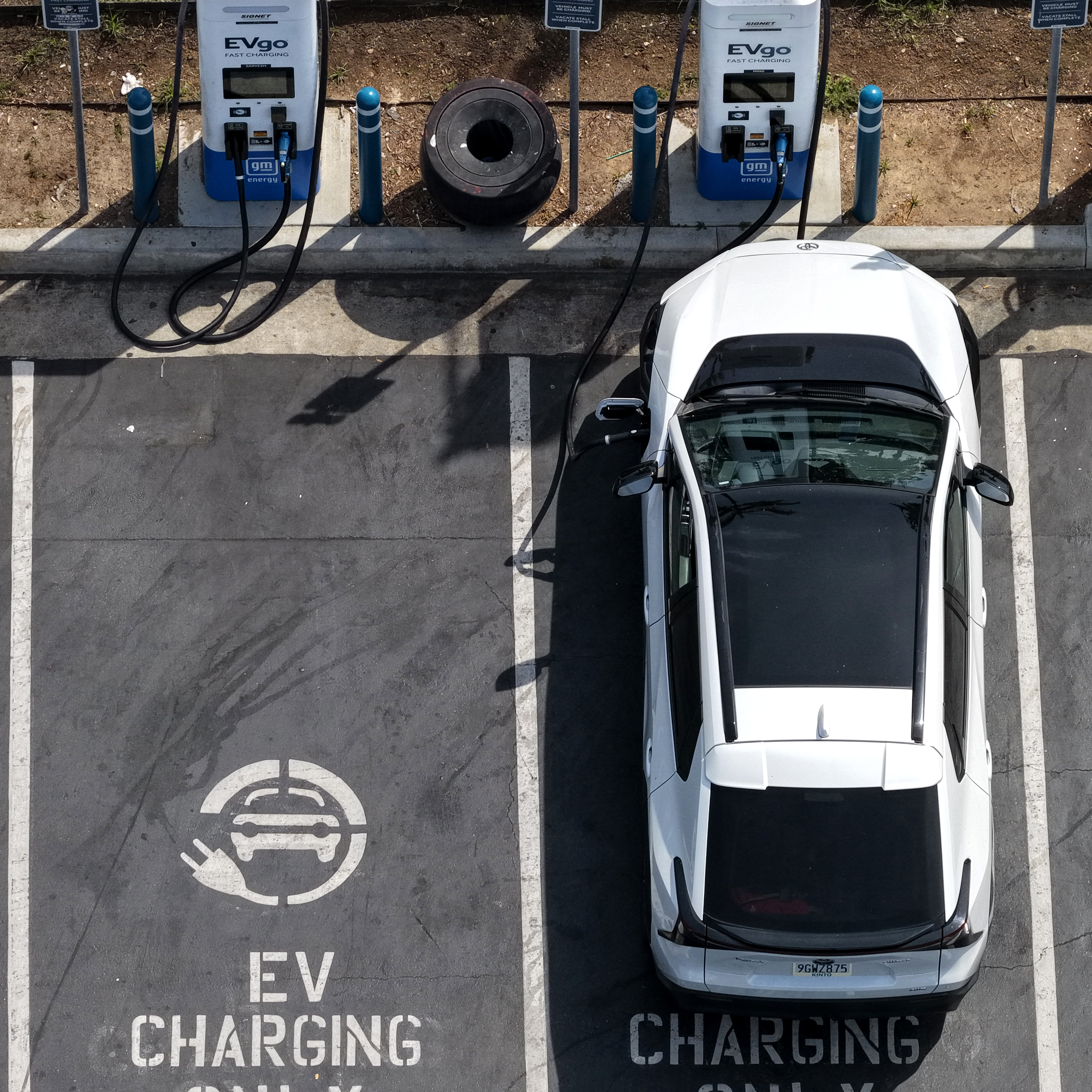 An EV charges at an EVgo electric charger in California.