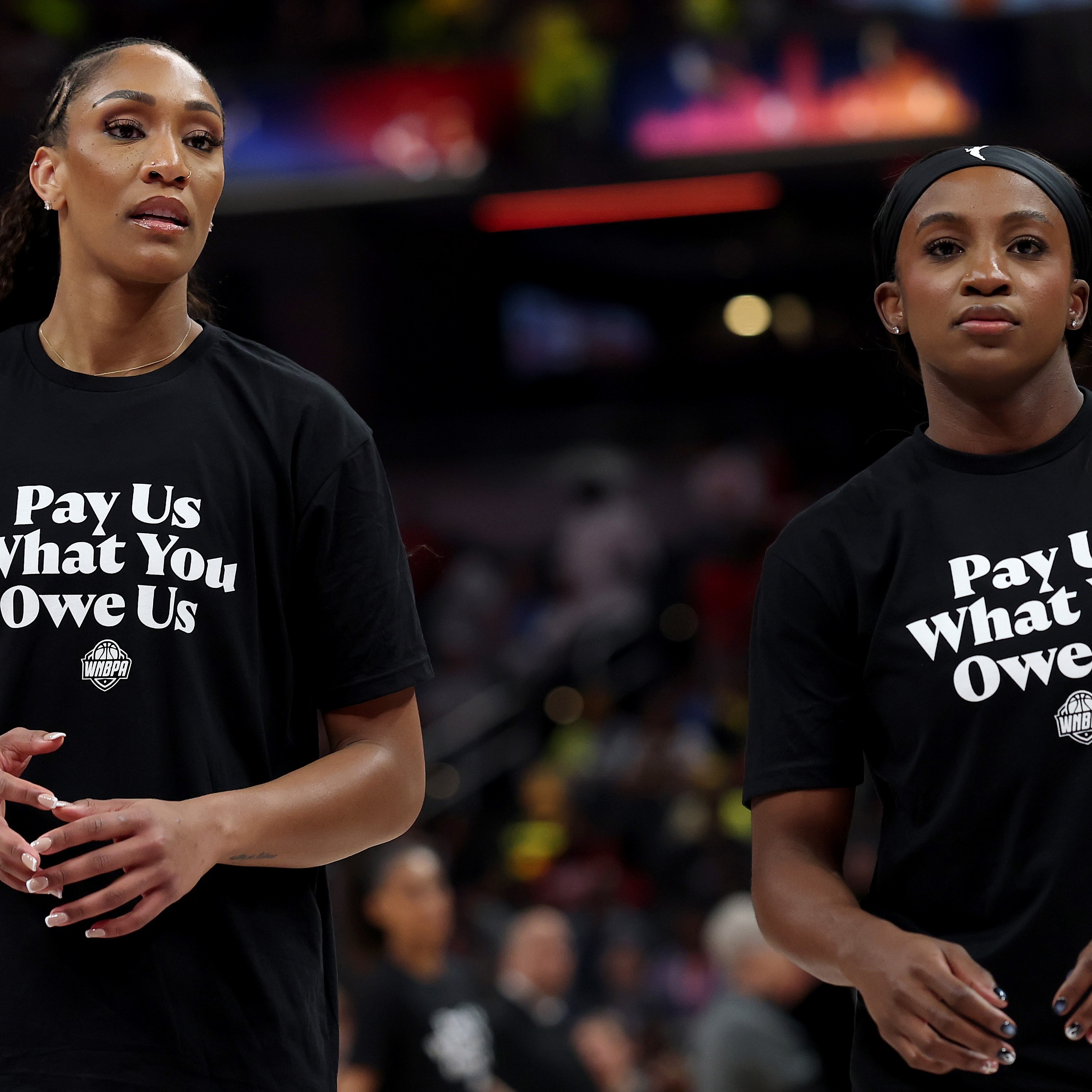 Three-time WNBA champion A’ja Wilson and Las Vegas Aces teammate Jackie Young are among the pro athletes getting raises.