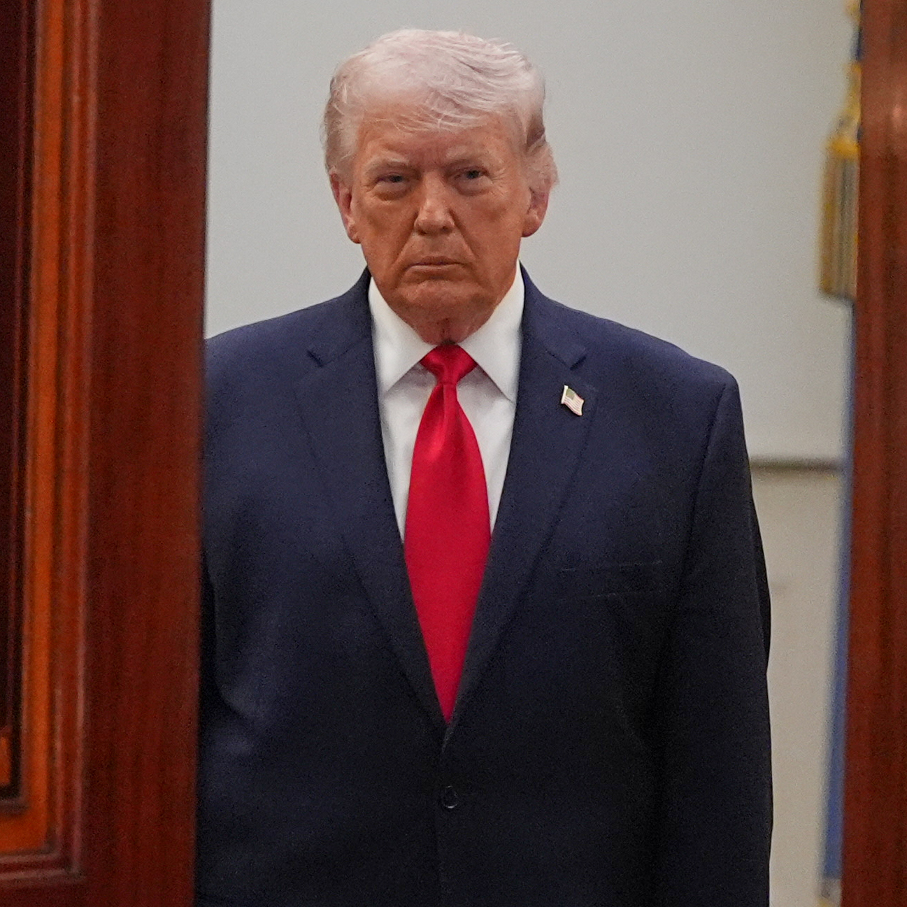 President Donald Trump arrives to address the nation from the Cross Hall of the White House on April 1, 2026 in Washington, DC.
