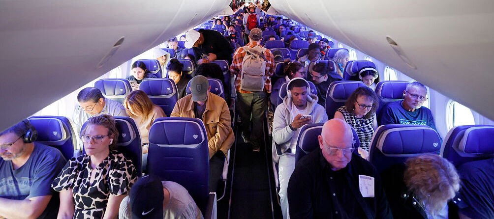 A photo of passengers seated on a Southwest Airlines flight
