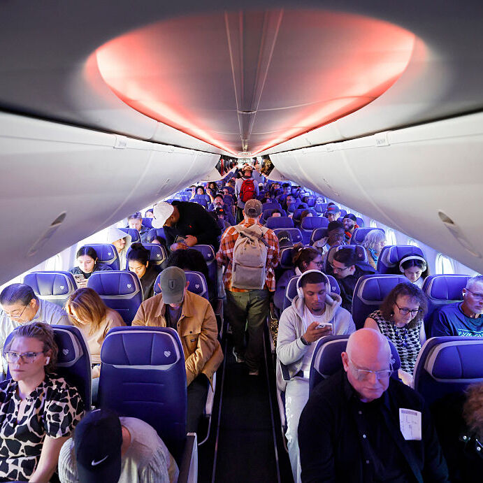 A photo of passengers seated on a Southwest Airlines flight