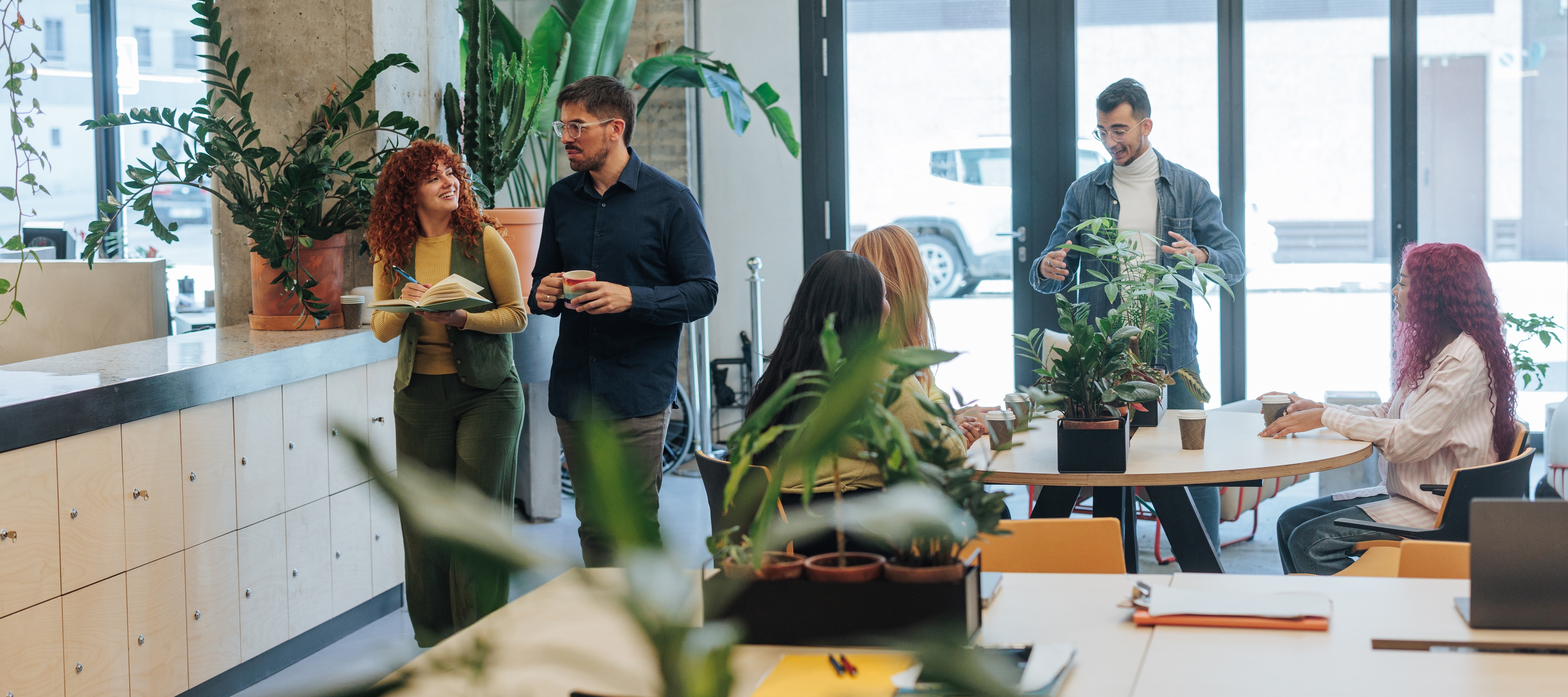 Business professionals collaborating and discussing ideas