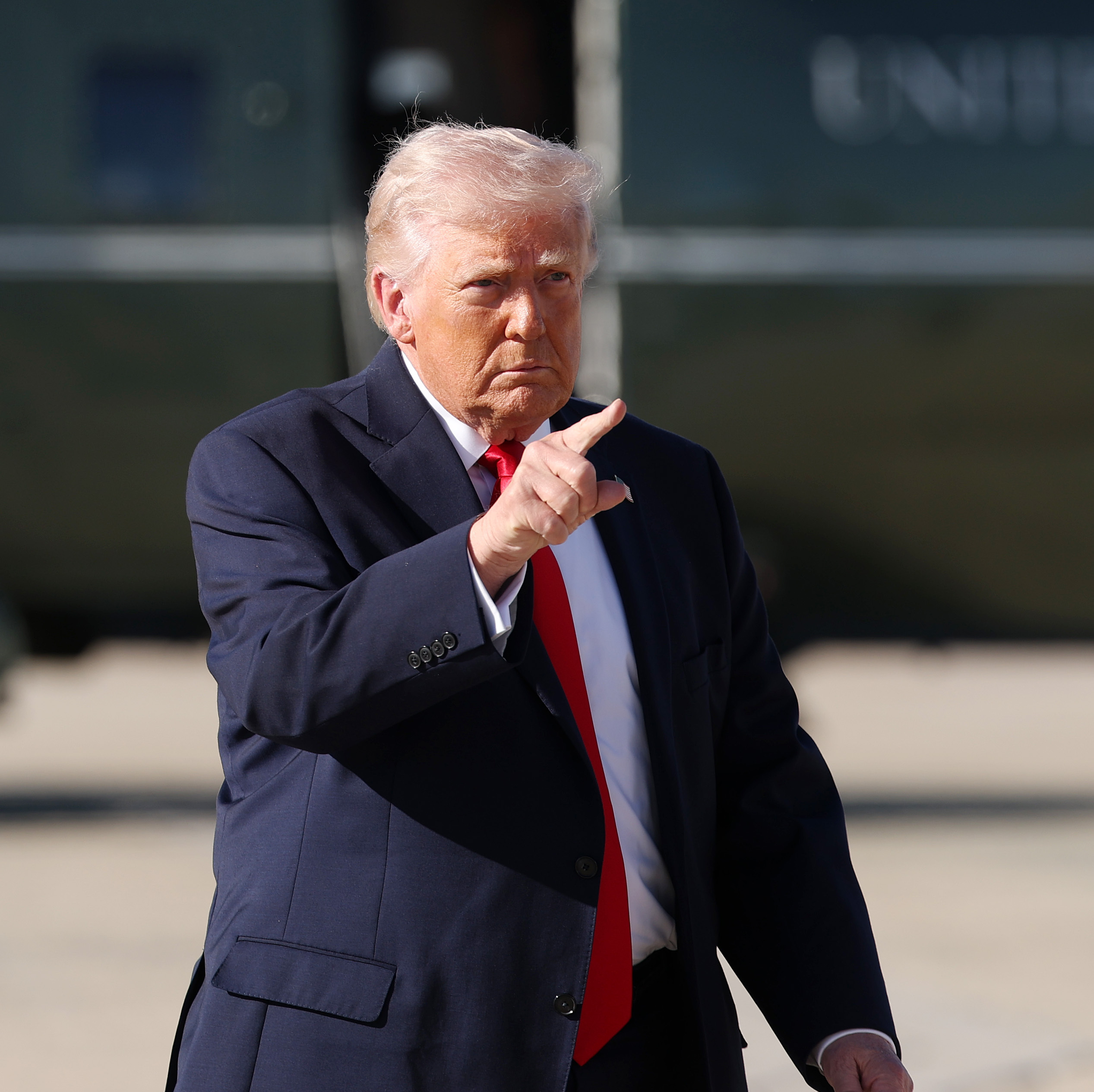 President Donald Trump walks to Air Force One.