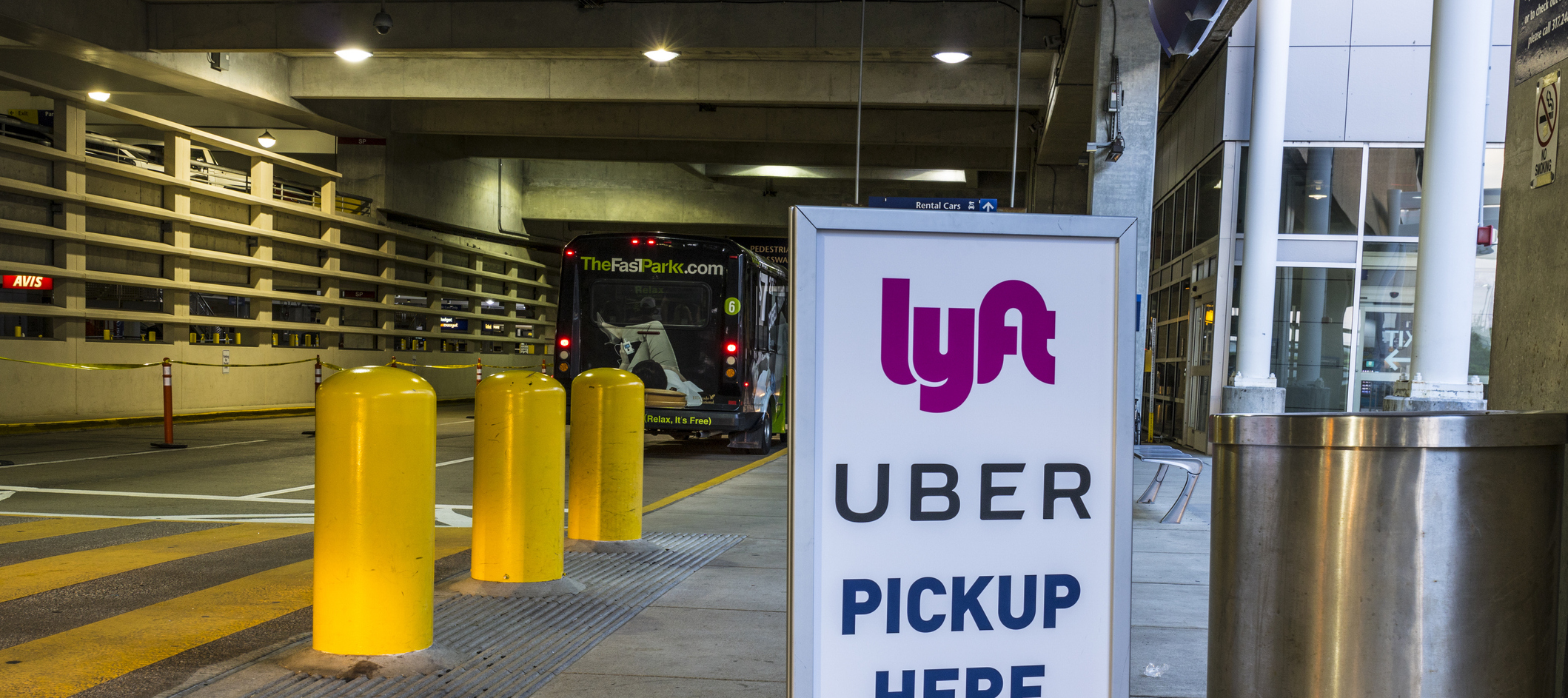 Photo of an Uber and Lyft pickup area at an airport
