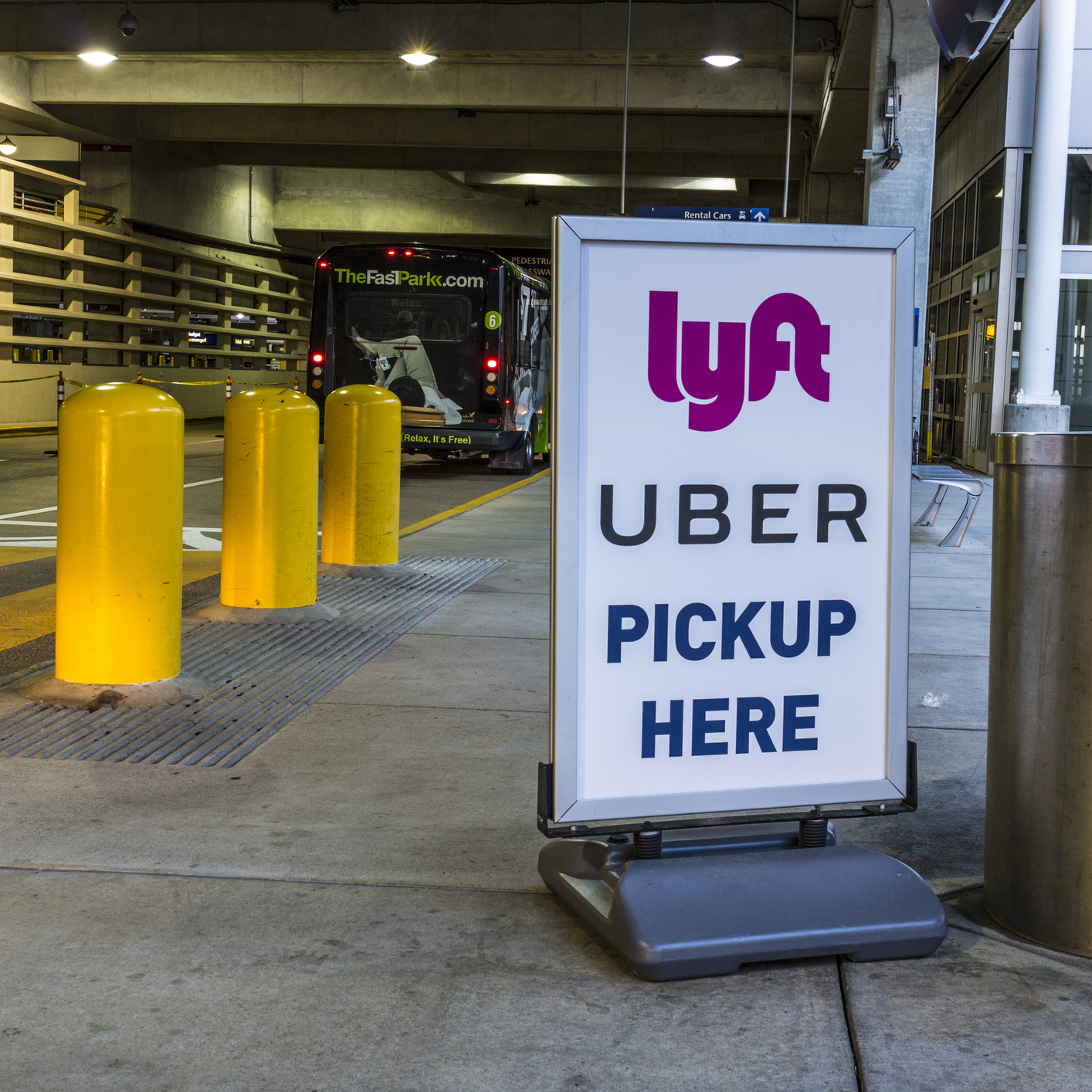 Photo of an Uber and Lyft pickup area at an airport