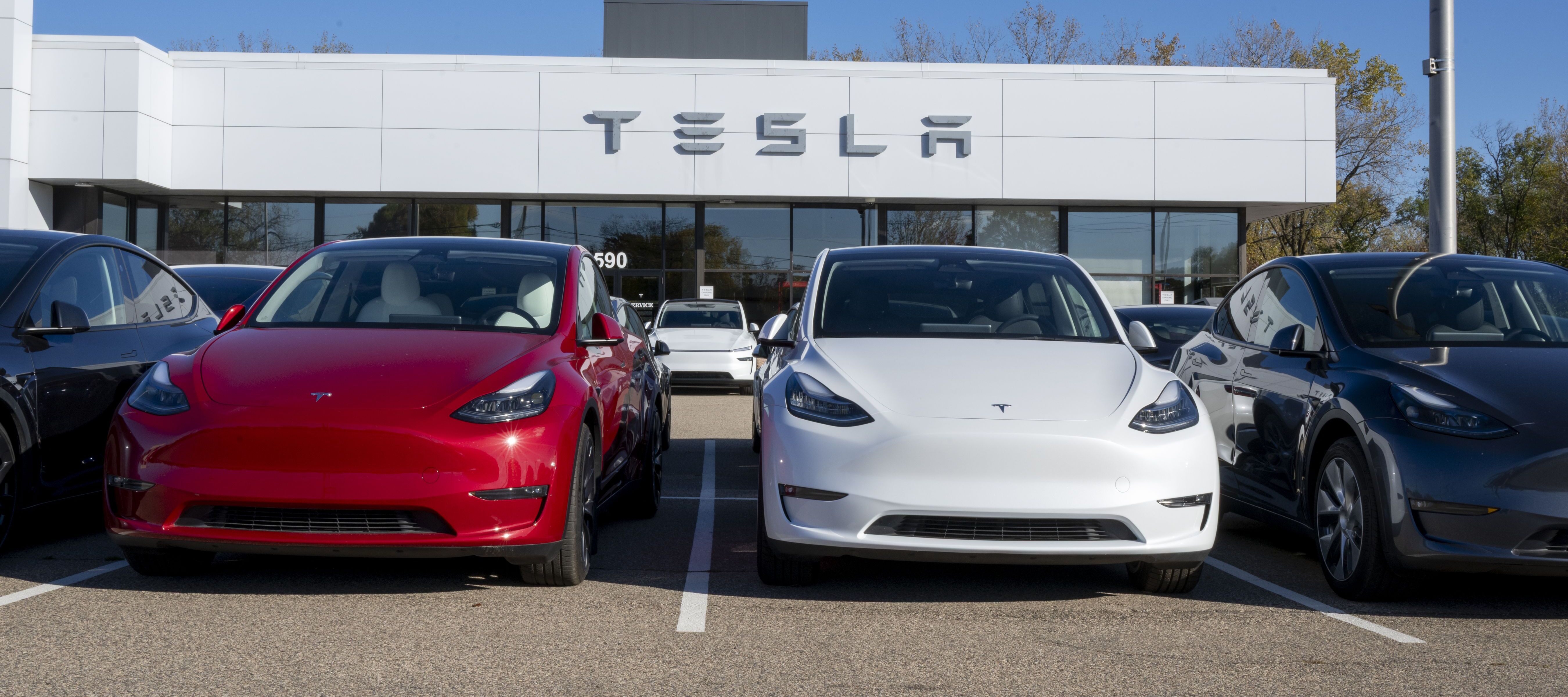 Maplewood, Minnesota. Tesla dealership with the new models displayed on the lot.