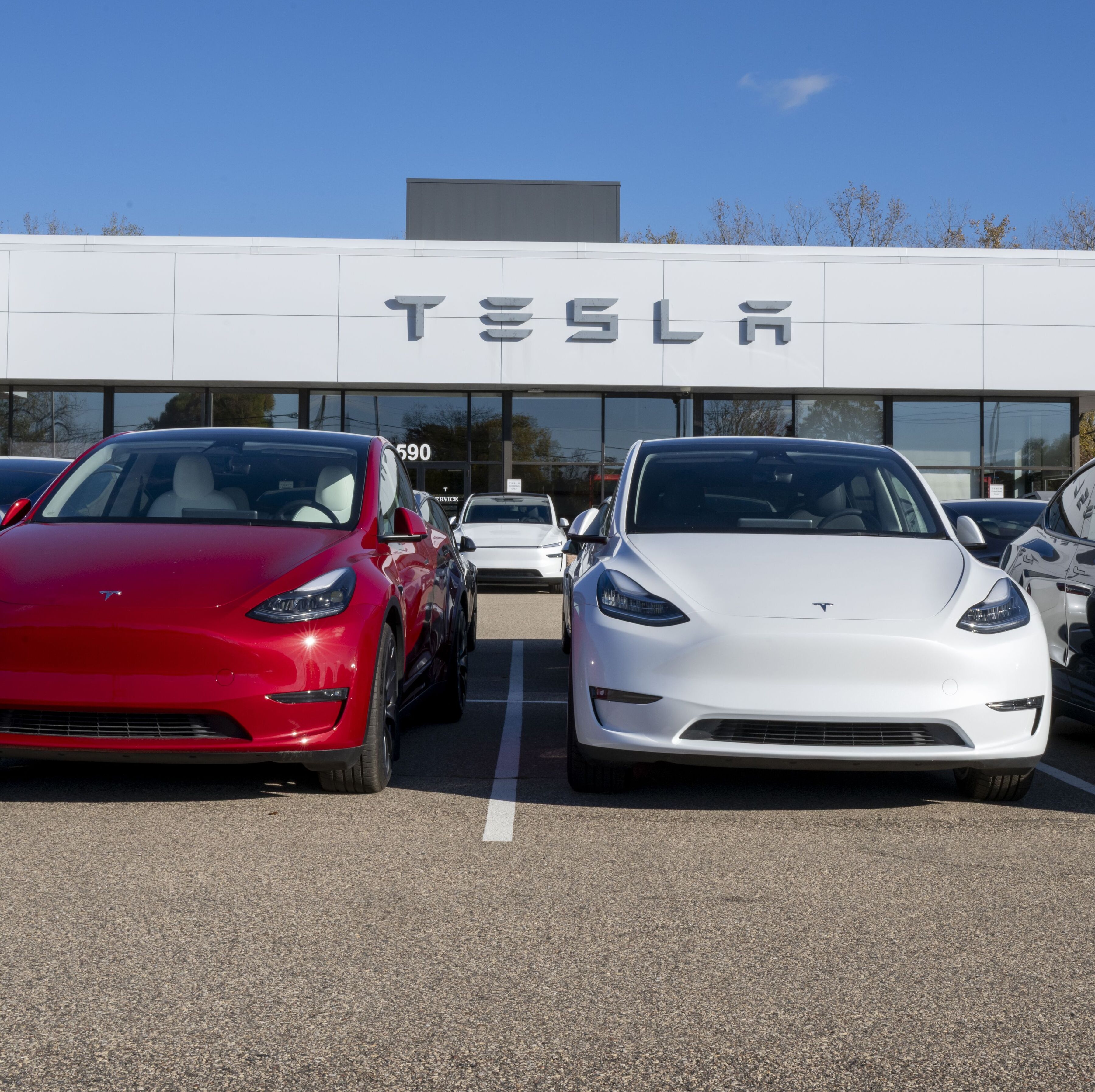 Maplewood, Minnesota. Tesla dealership with the new models displayed on the lot.