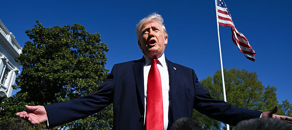 President Donald Trump speaks to the media as he prepares to depart from the White House