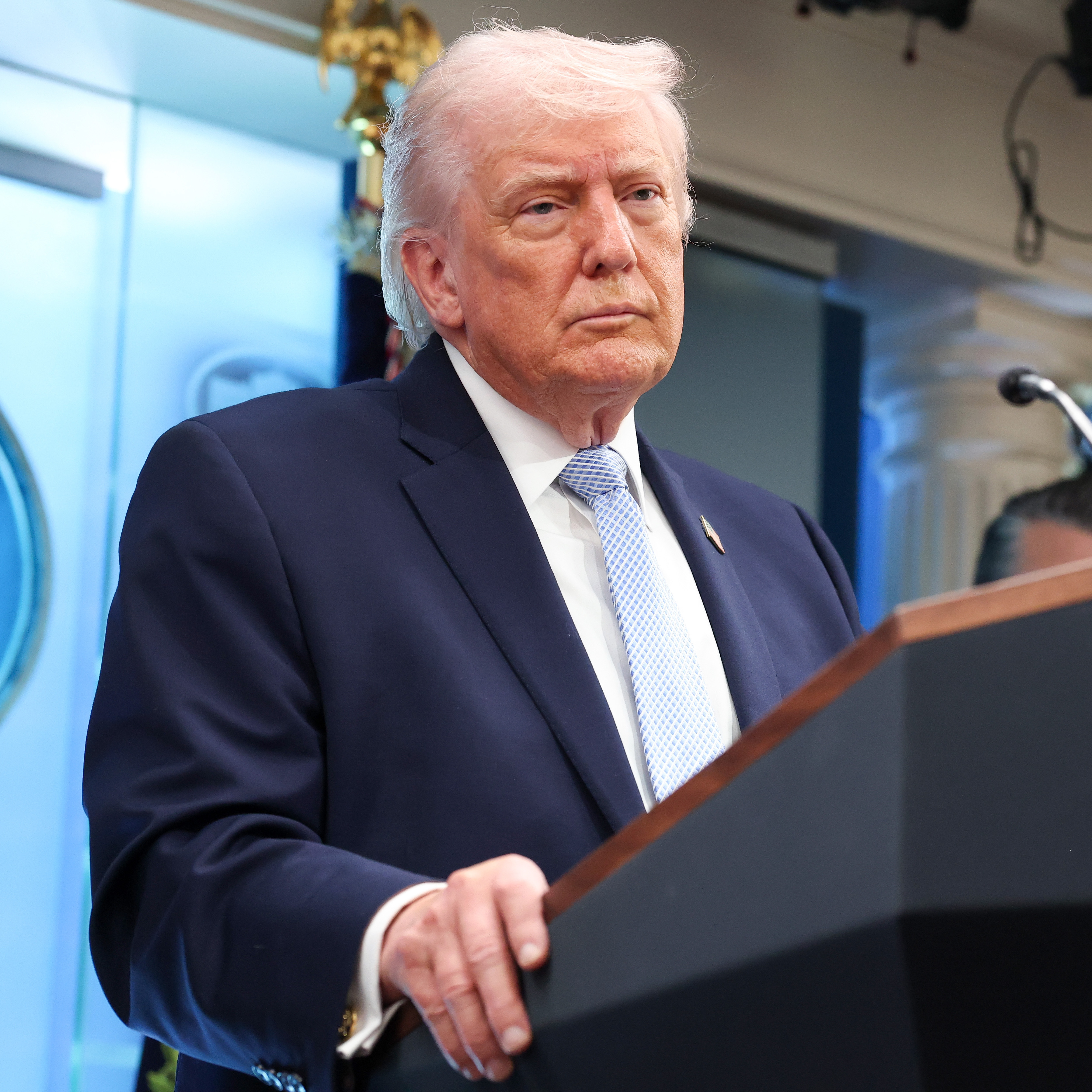 U.S. importers paid more than $165 billion after President Donald Trump, seen here in a news conference at the White House, introduced reciprocal tariffs in April 2025.