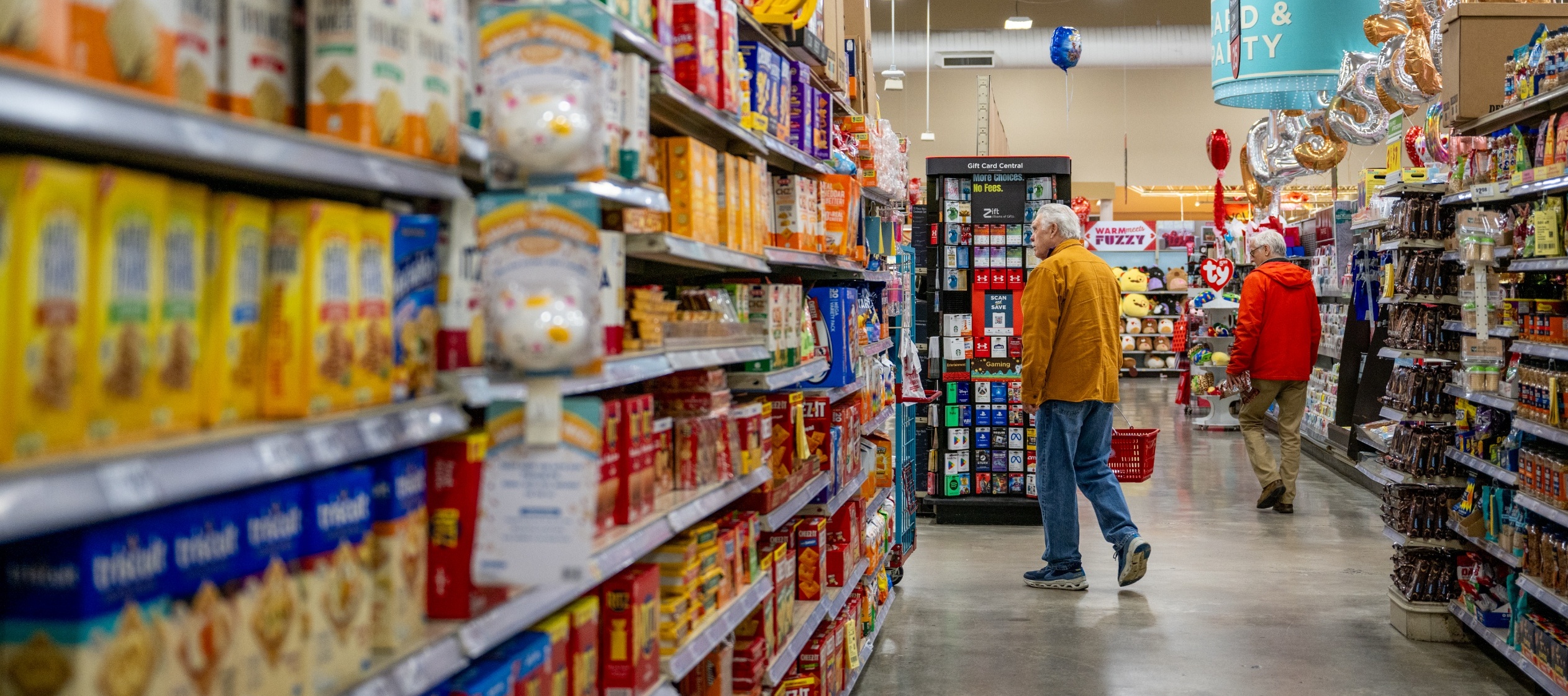 Customers shop for groceries in Austin, Texas.