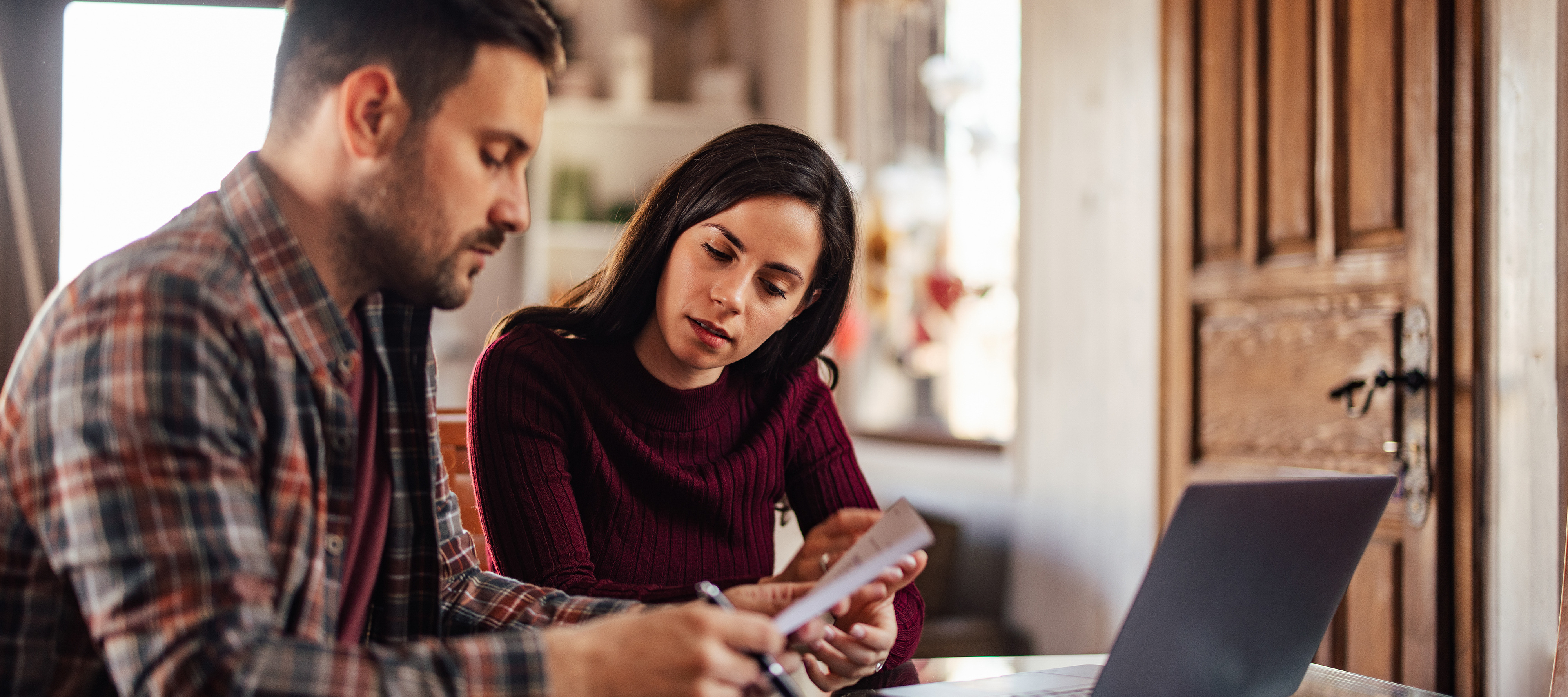 A couple goes over their finances.