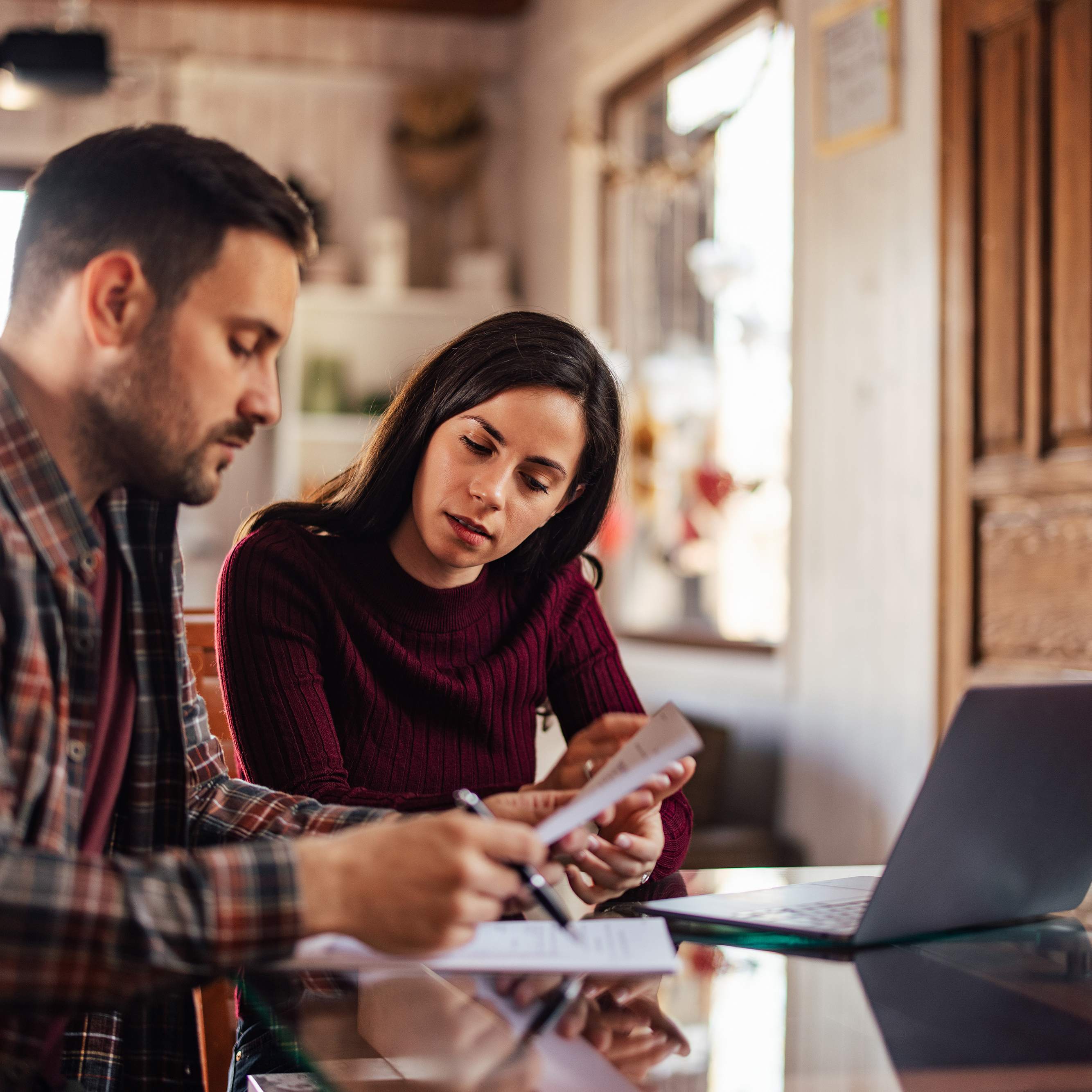 A couple goes over their finances.