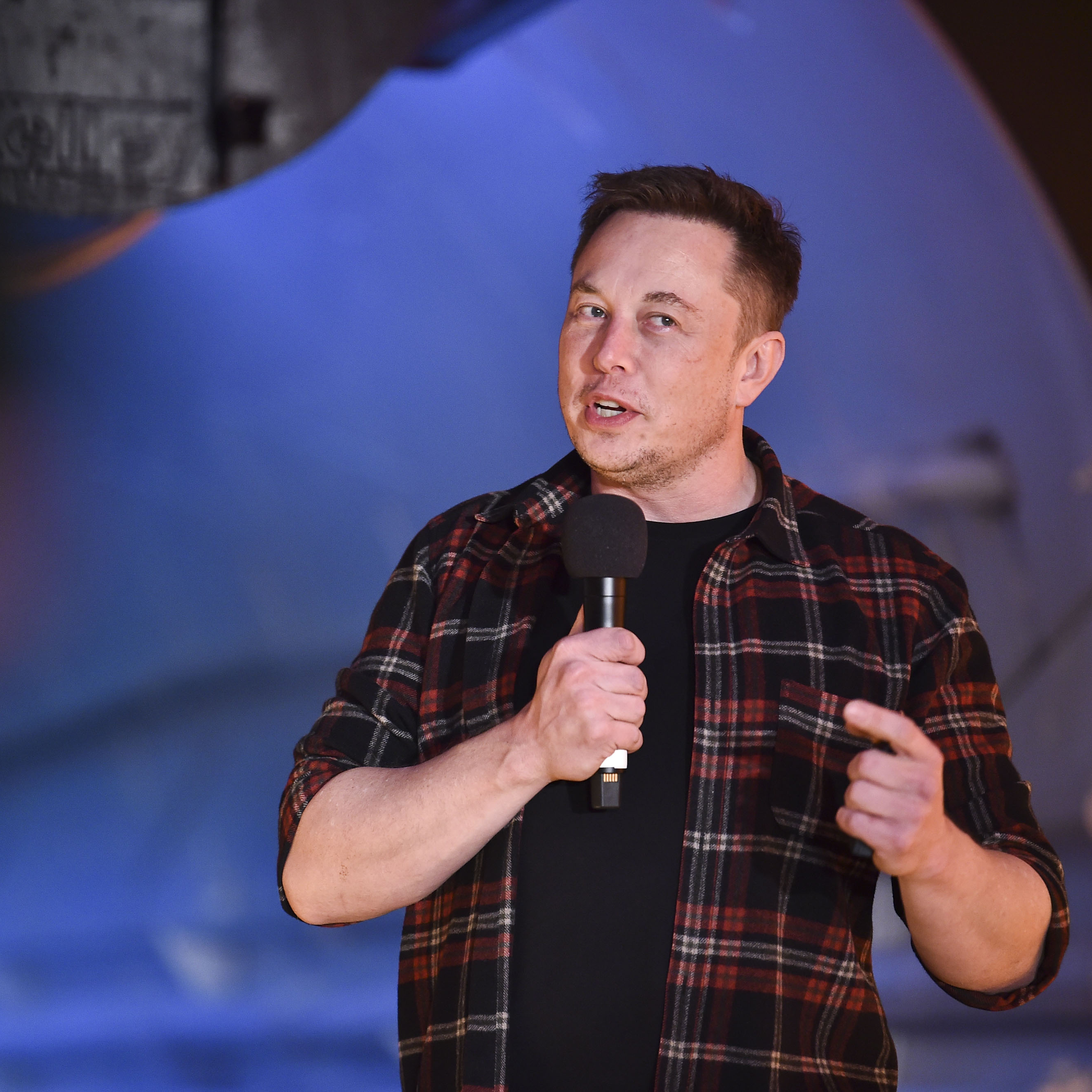 SpaceX CEO Elon Musk speaks to a crowd gathered at an event in California.