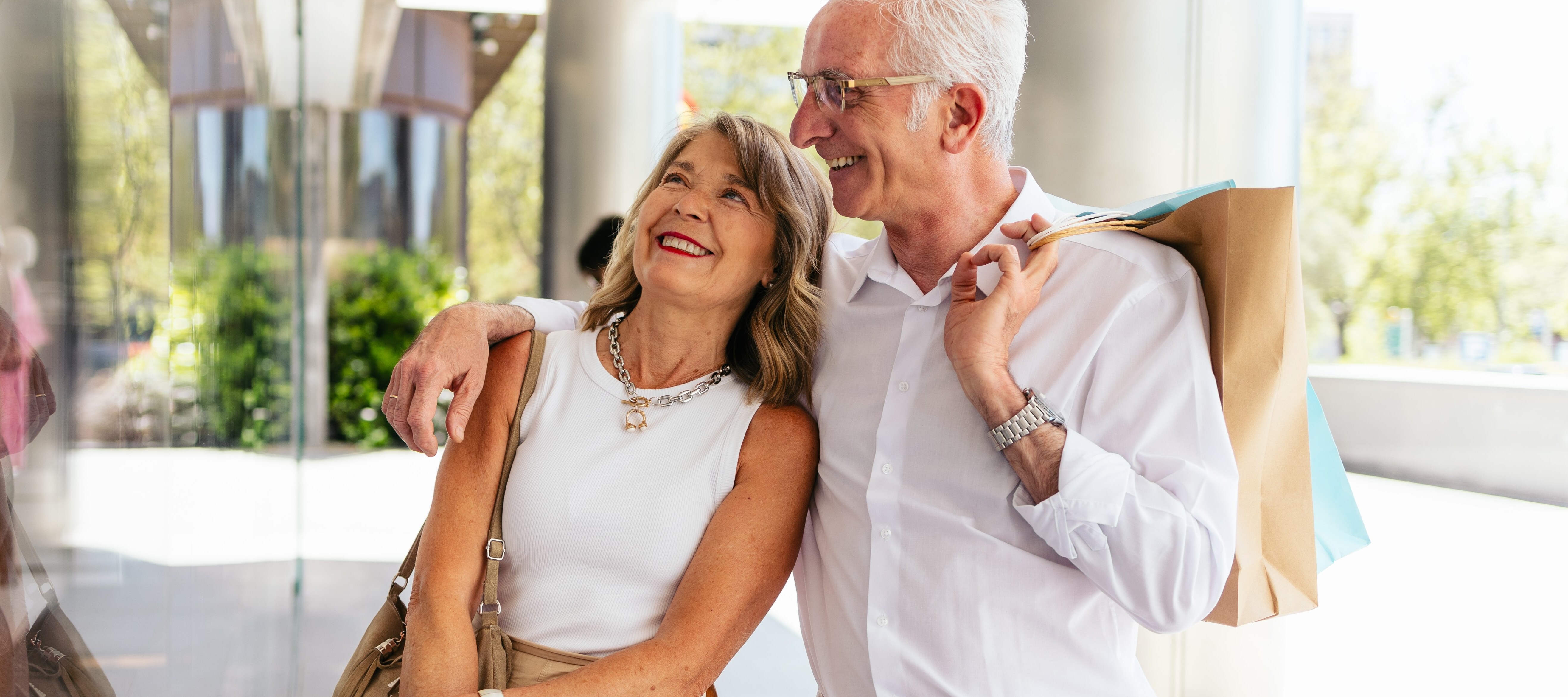 Older couple shopping happily