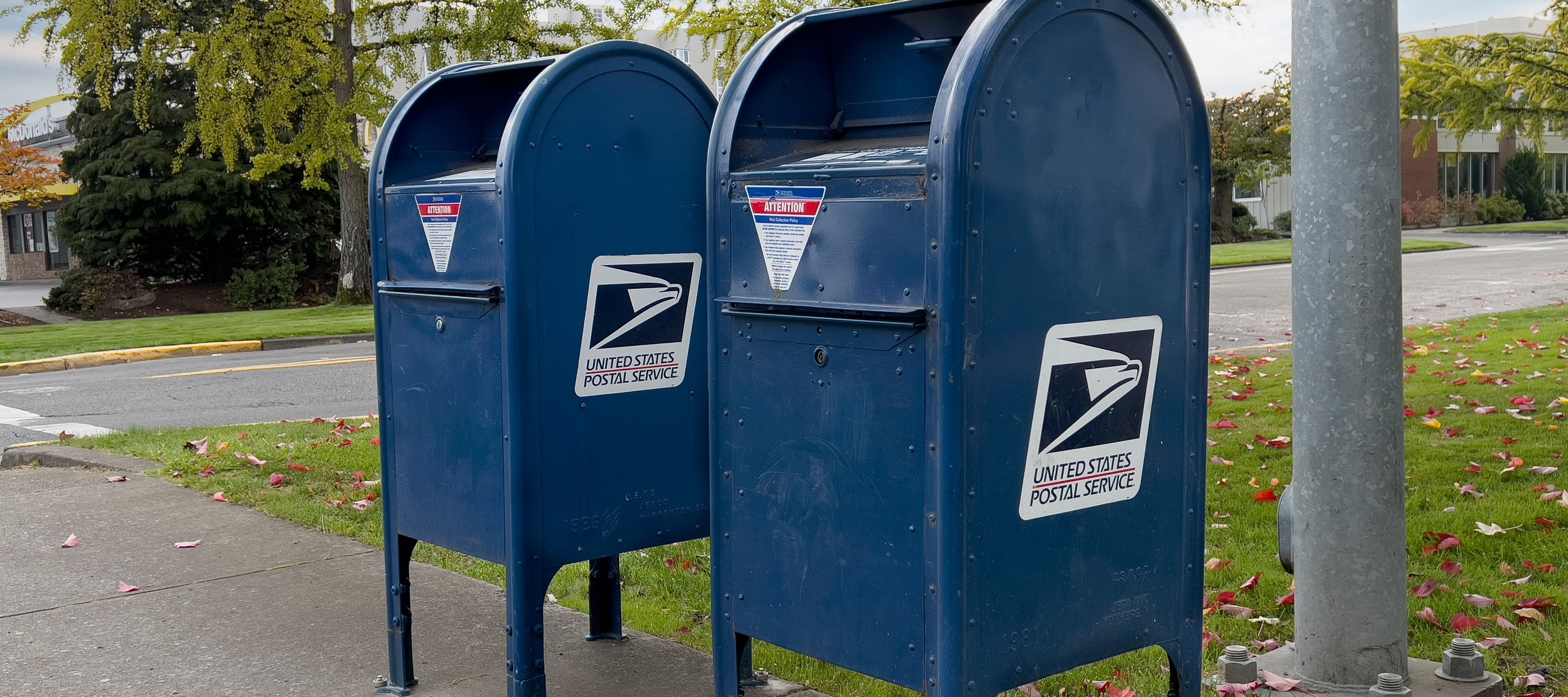 Row of USPS post boxes