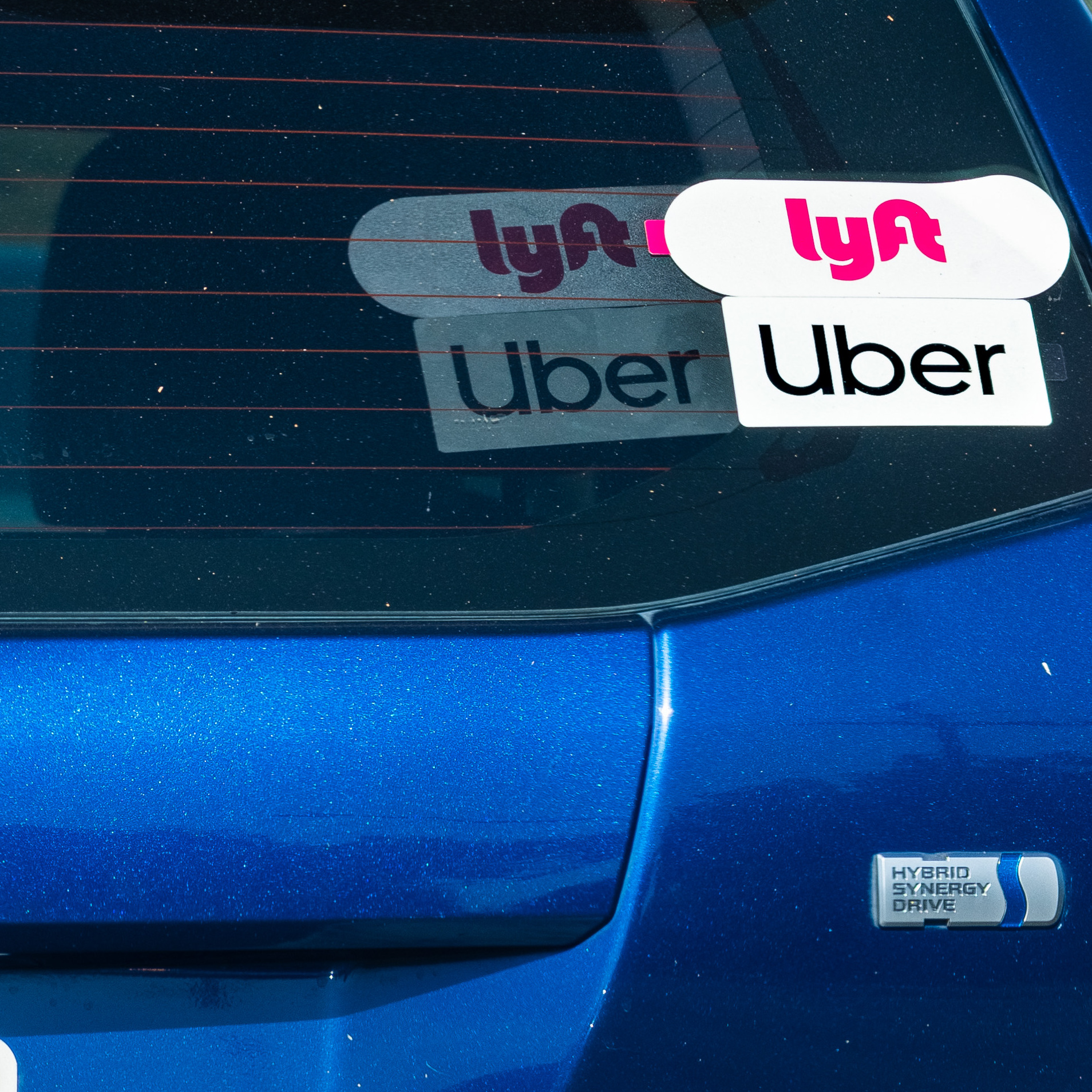 A Toyota Prius offering Lyft and Uber rides in California.