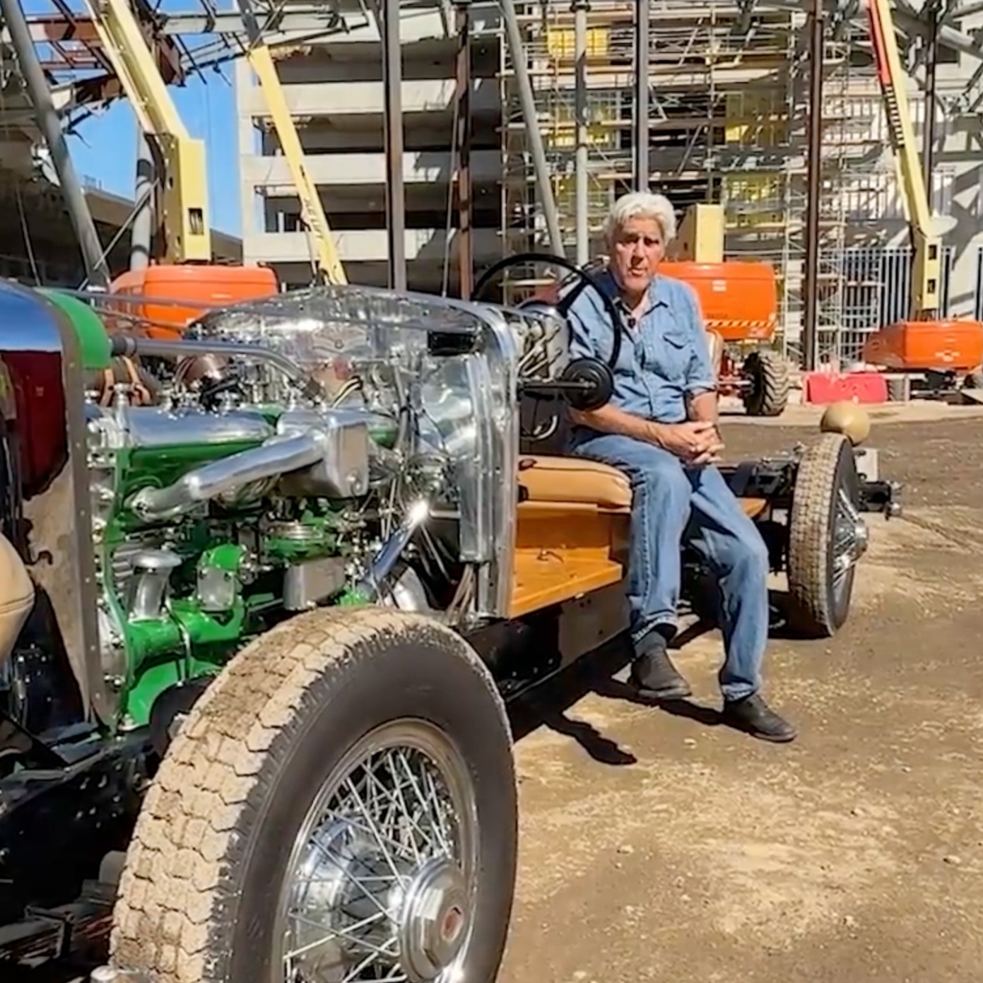 Jay Leno sits in a 1930 Duesenberg to sell airport revenue bonds to help fund the Hollywood Burbank Airport renovation.