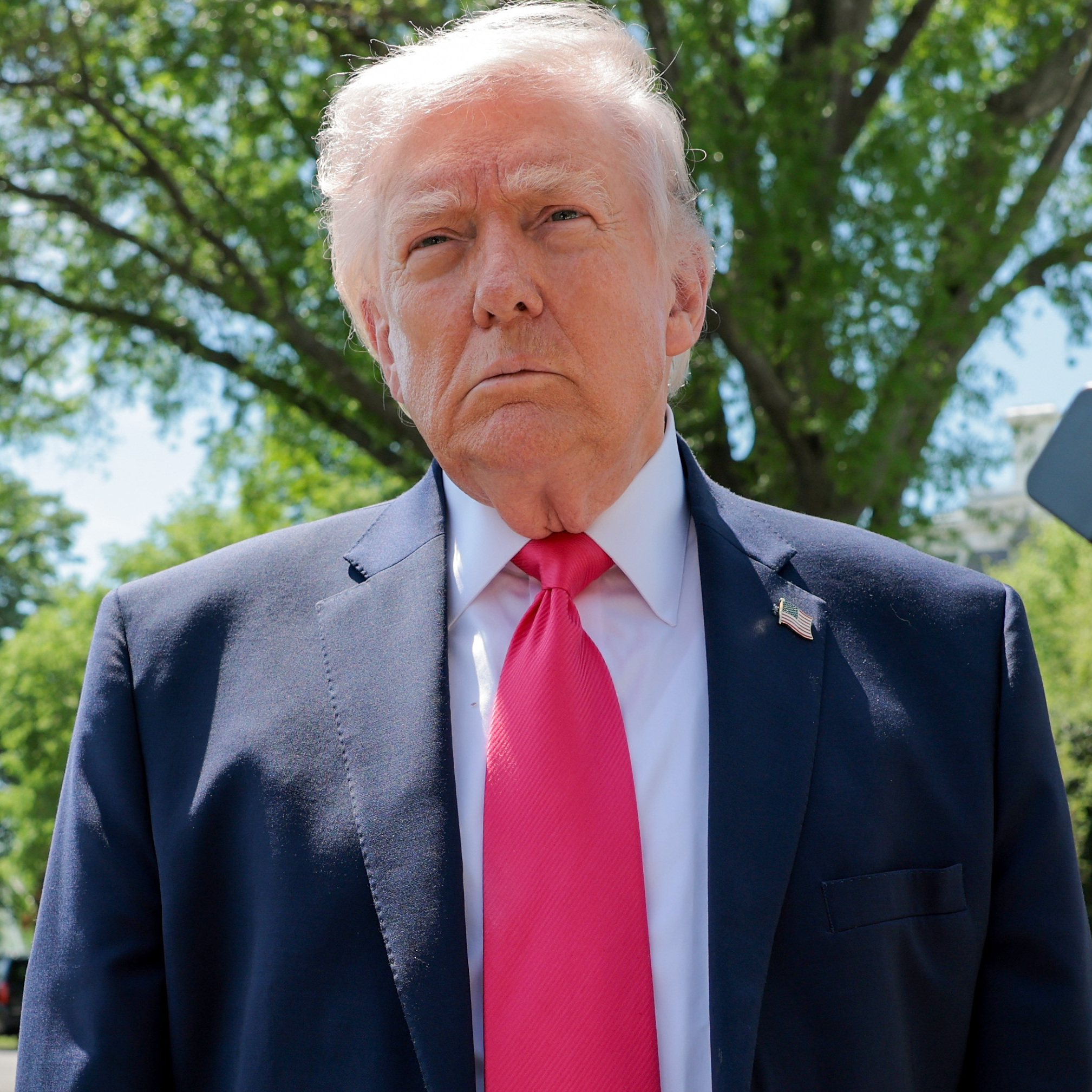 President Trump, seen here on the south lawn outside the White House, saw his approval rating on the economy slid to 30% in April.