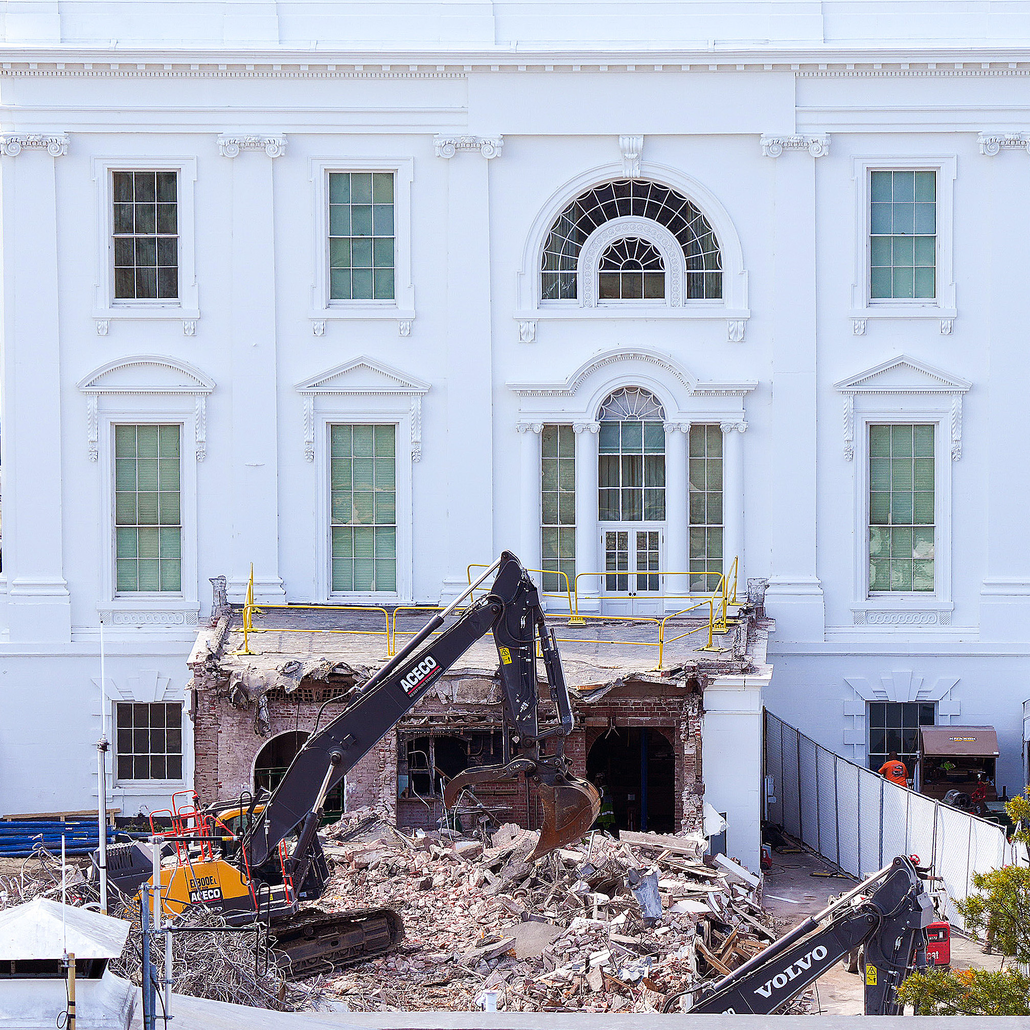 An excavator works to clear rubble after the East Wing of the White House was demolished to make room for a ballroom.