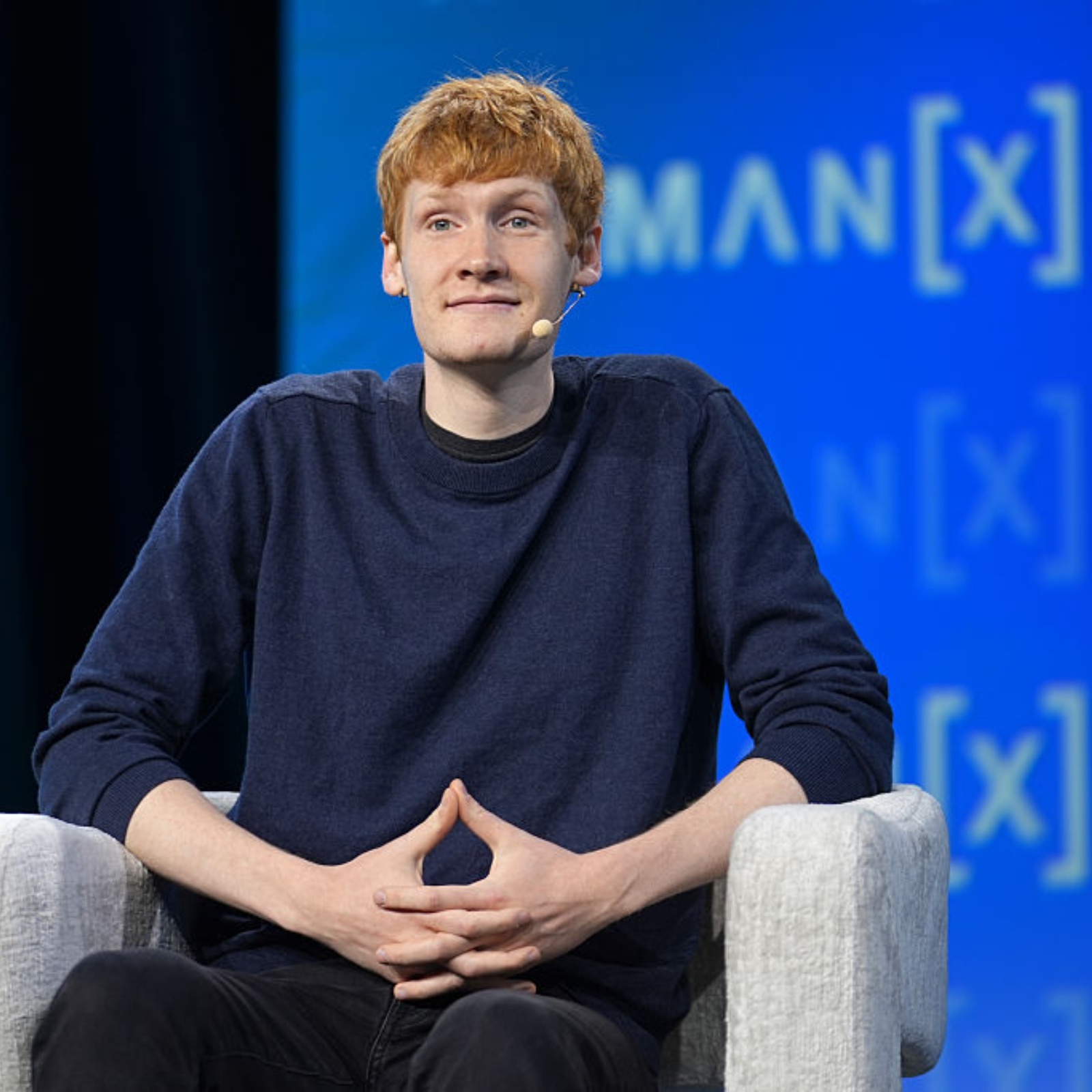 A photo of SpaceX founder Elon Musk and Cursor CEO Michael Truell